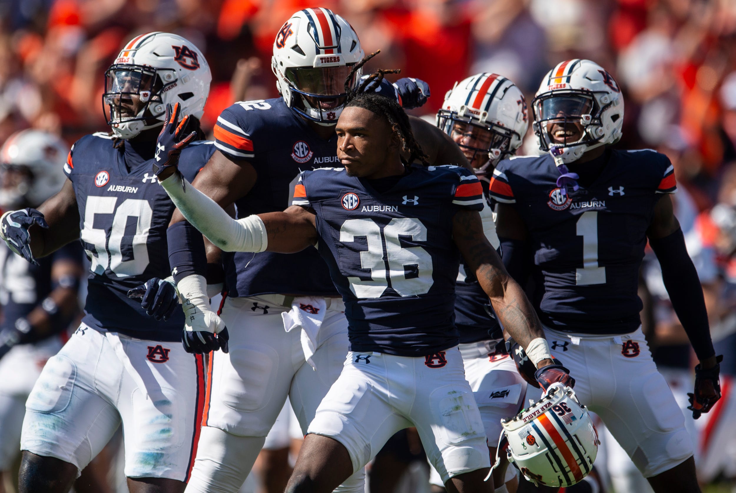 Auburn Tigers defensive back Jaylin Simpson (36) celebrates his interception as Auburn Tigers take on Georgia Bulldogs at Jordan-Hare Stadium in Auburn, Ala., on Saturday, Sept. 30, 2023.