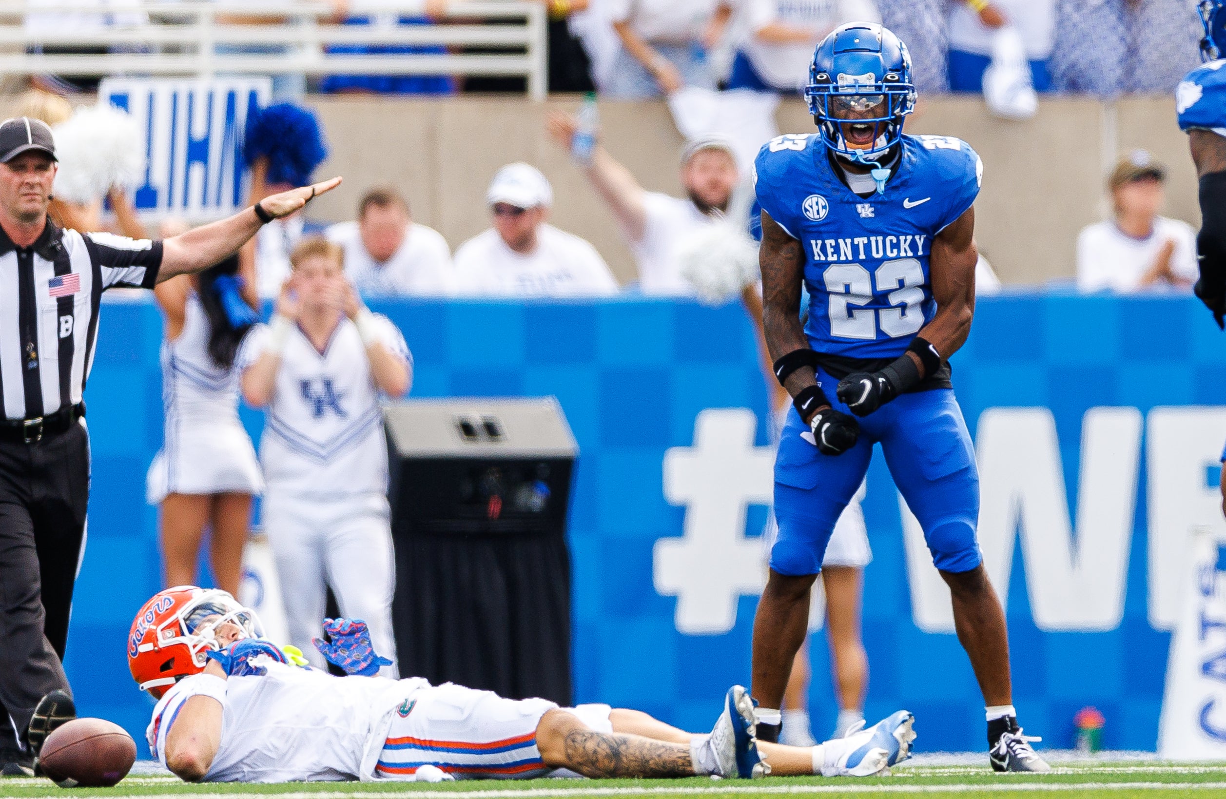 Sep 30, 2023; Lexington, Kentucky, USA; Kentucky Wildcats defensive back Andru Phillips (23) celebrates an incomplete pass intended for Florida Gators wide receiver Ricky Pearsall (1) during the second quarter at Kroger Field.
