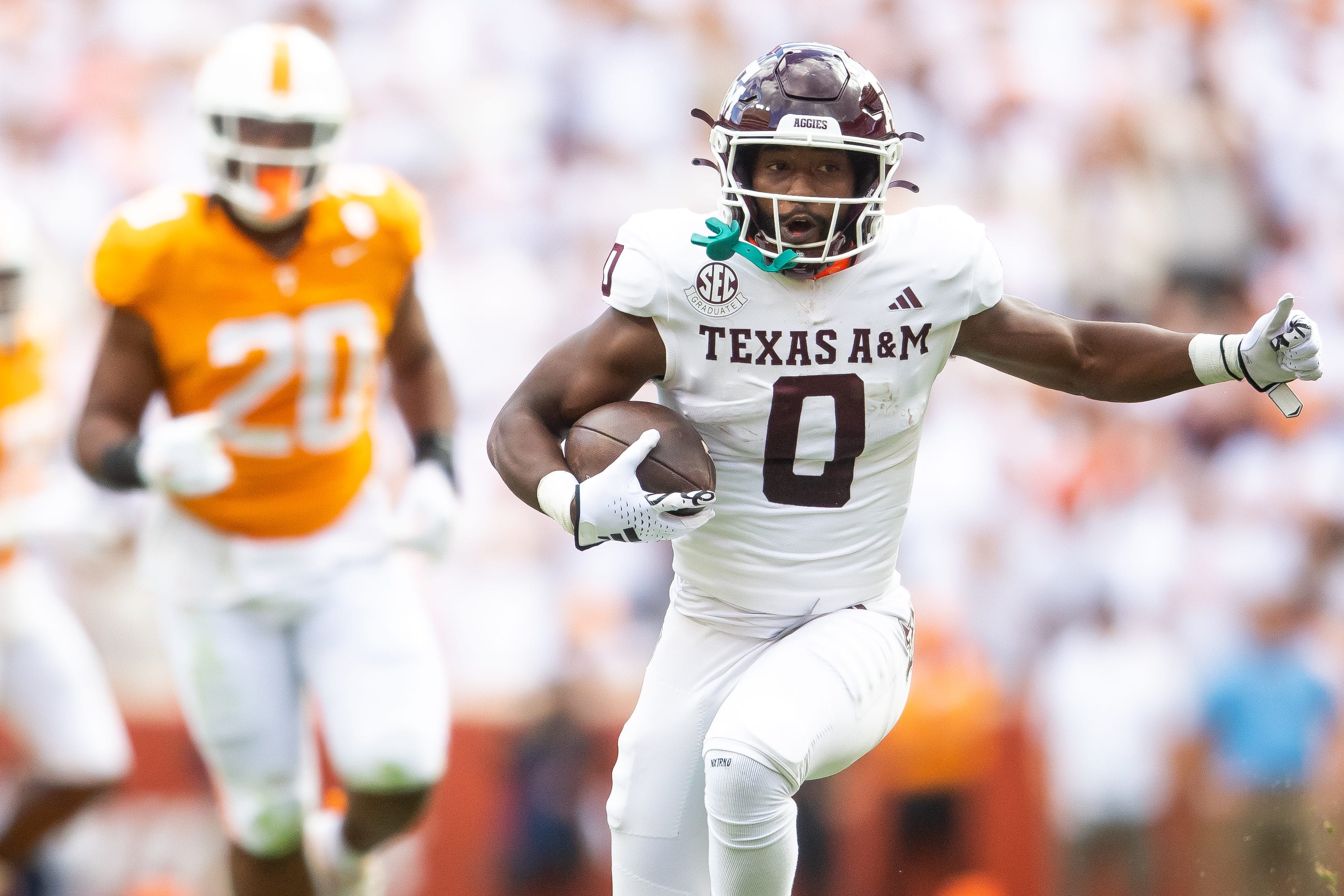 Texas A&M wide receiver Ainias Smith (0) runs the ball during a football game between Tennessee and Texas A&M at Neyland Stadium in Knoxville, Tenn., on Saturday, Oct. 14, 2023.