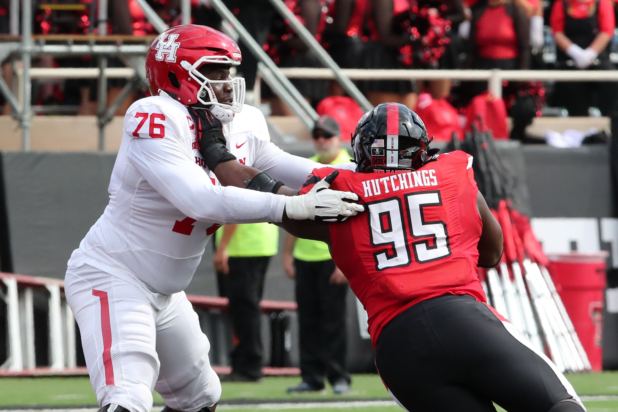 Sep 30, 2023; Lubbock, Texas, USA; Houston Cougars offensive tackle Patrick Paul (76) blocks Texas Tech Red Raiders defensive tackle Jaylon Hutchings (95) in the second half at Jones AT&T Stadium and Cody Campbell Field.