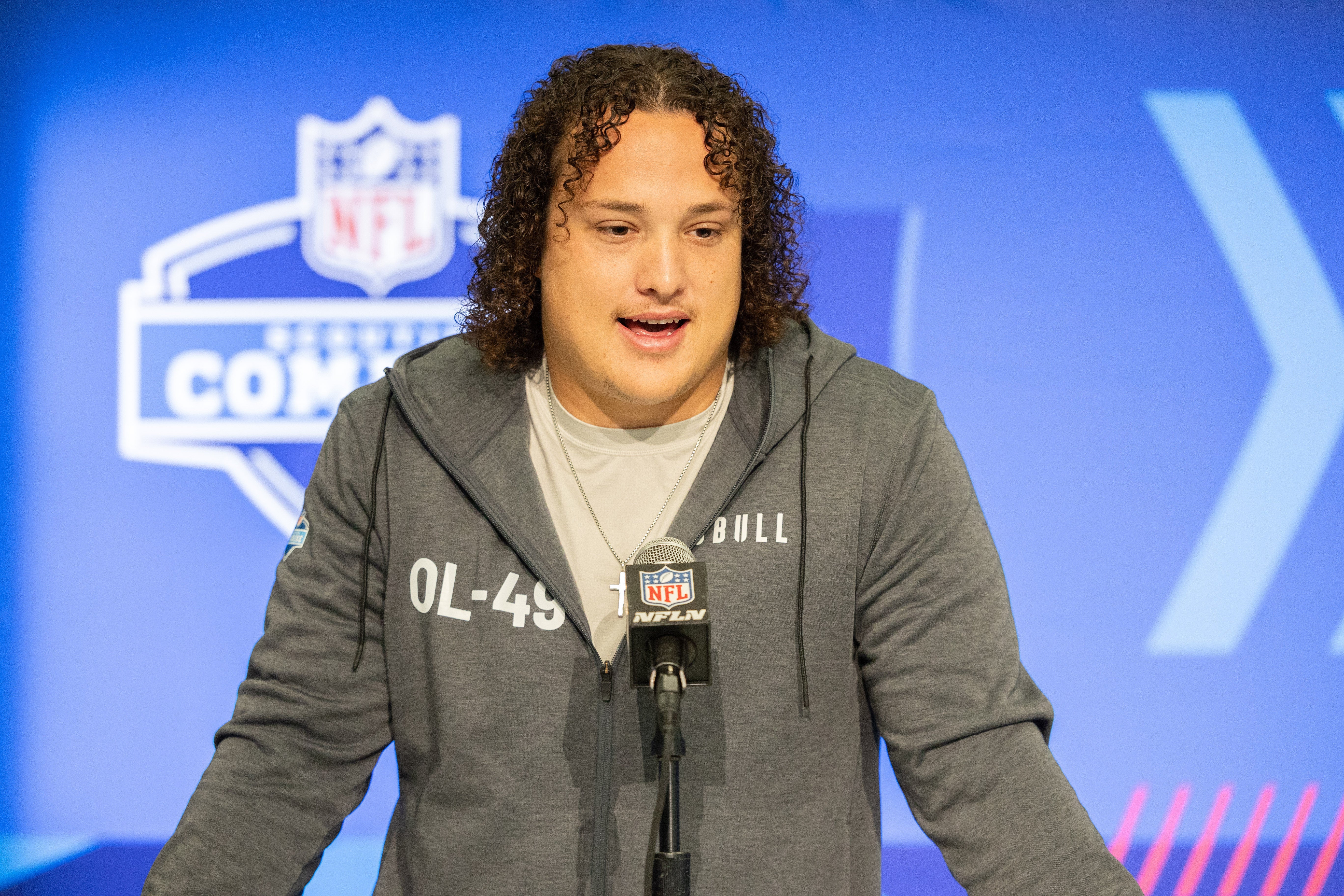 Mar 2, 2024; Indianapolis, IN, USA; North Carolina State offensive lineman Dylan McMahon (OL49) talks to the media during the 2024 NFL Combine at Lucas Oil Stadium.
