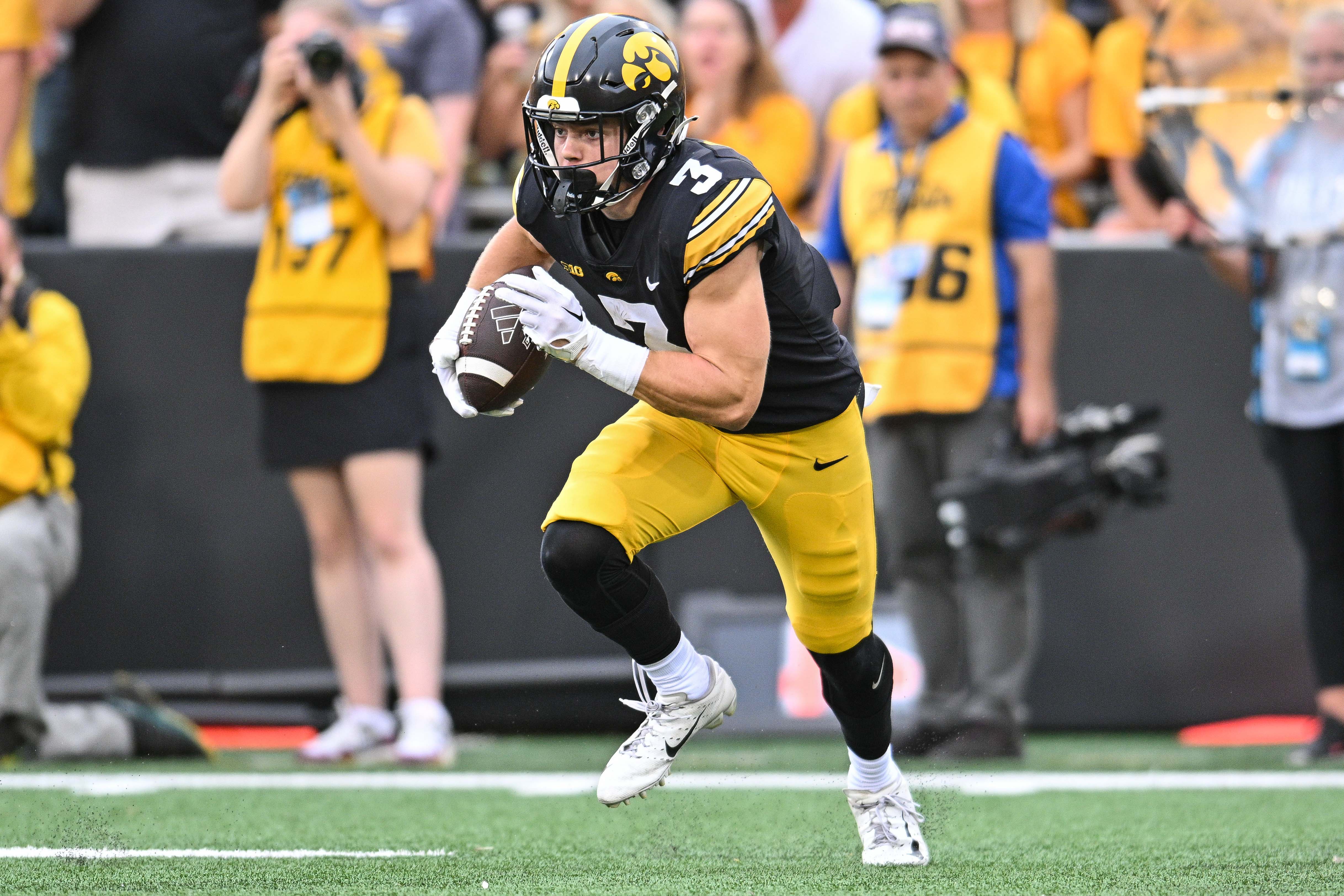 Sep 16, 2023; Iowa City, Iowa, USA; Iowa Hawkeyes defensive back Cooper DeJean (3) returns a punt against the Western Michigan Broncos during the second quarter at Kinnick Stadium.