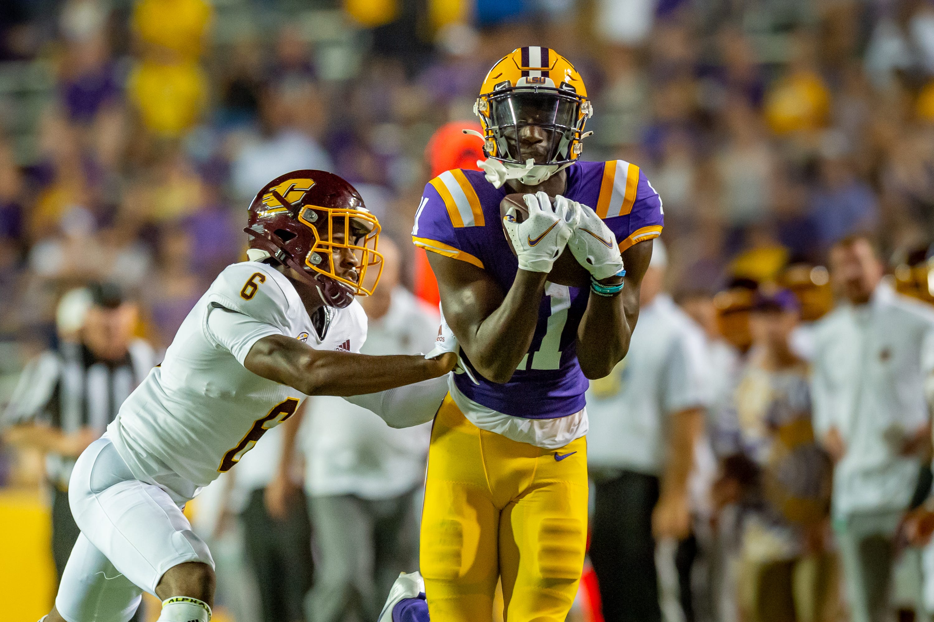 Brian Thomas Jr catches a pass as The LSU Tigers take on Central Michigan Chippewas in Tiger Stadium. Saturday, Sept. 18, 2021.