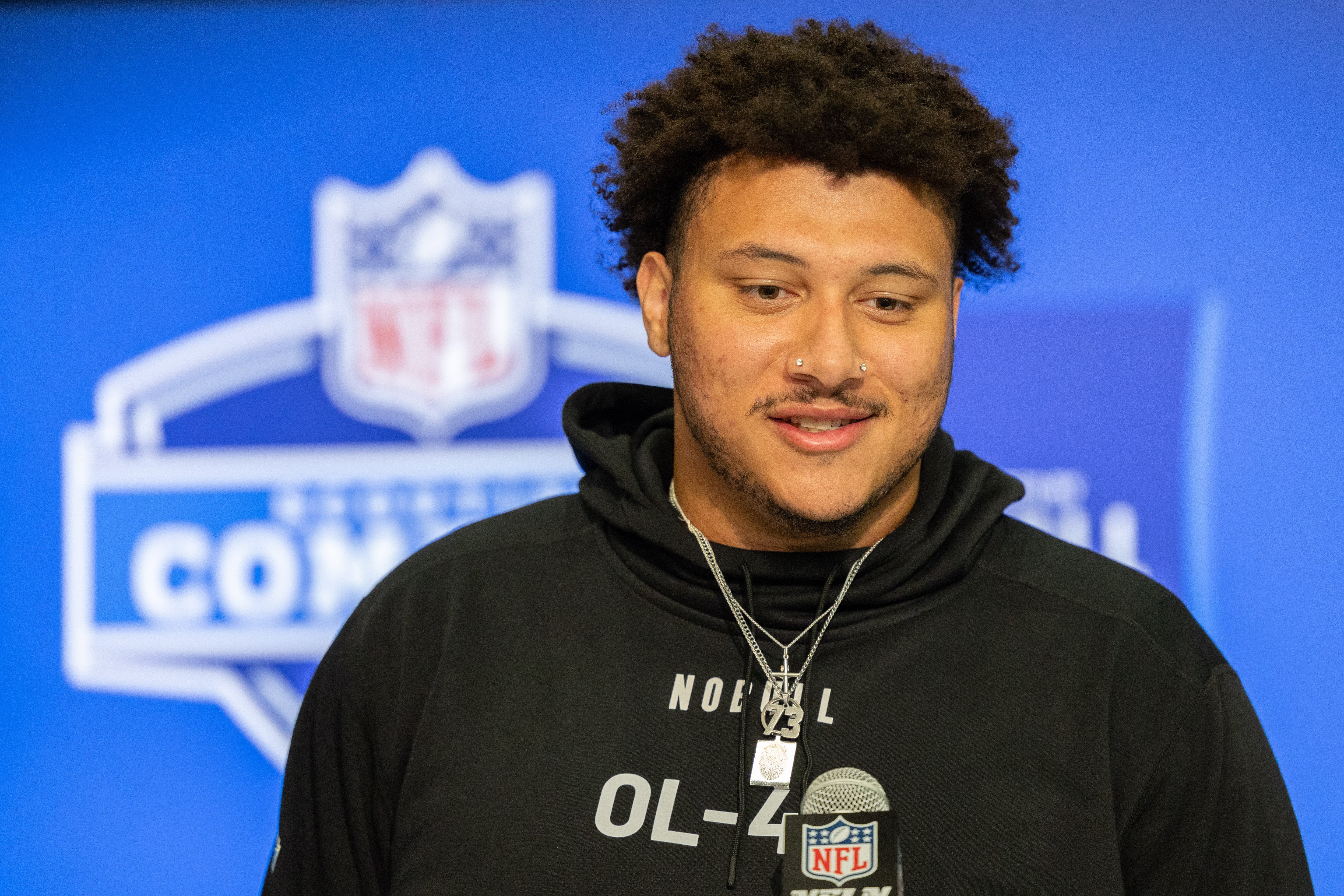 Mar 2, 2024; Indianapolis, IN, USA; Boston College offensive lineman Christian Mahogany (OL46) talks to the media during the 2024 NFL Combine at Lucas Oil Stadium.