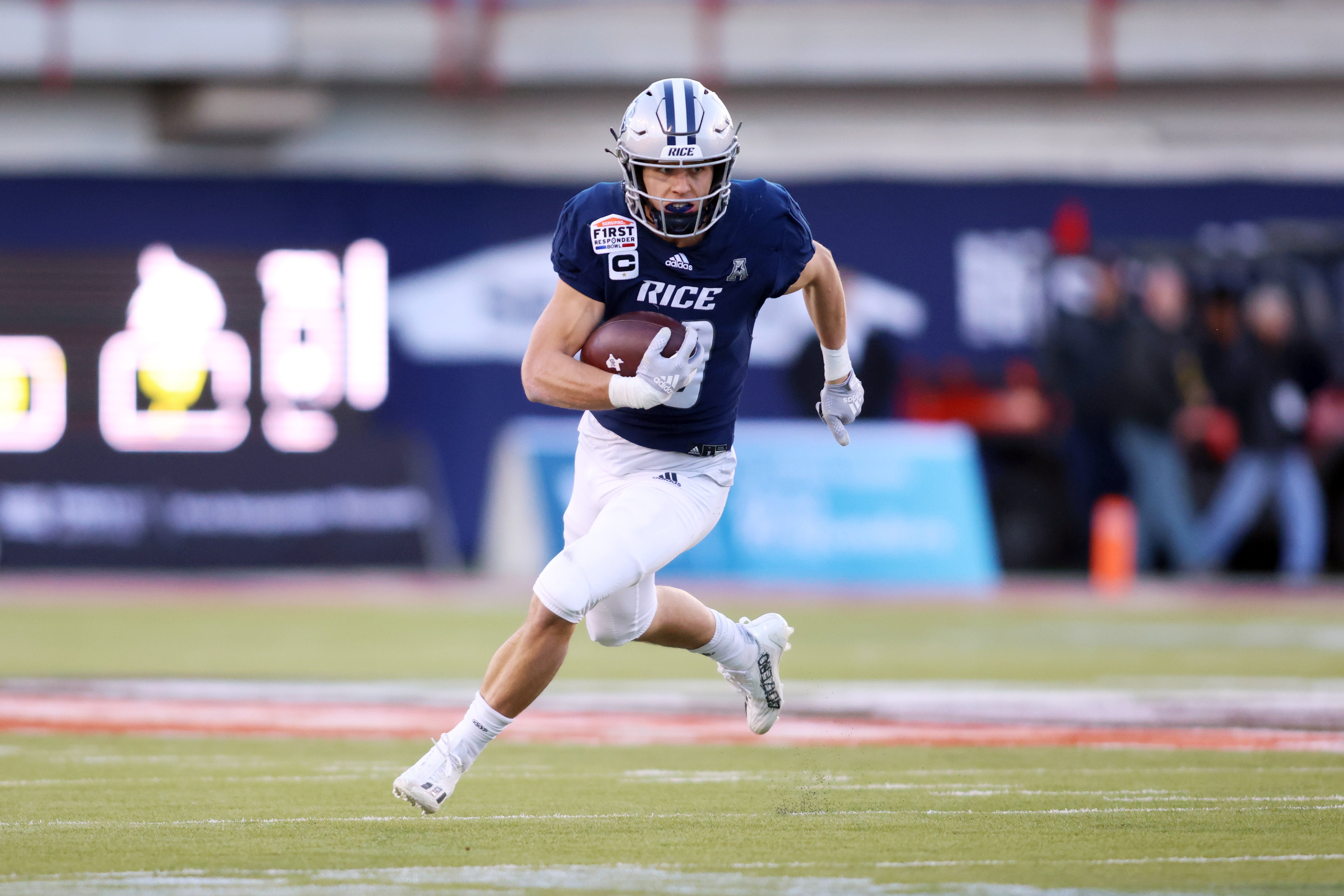 Dec 26, 2023; Dallas, TX, USA; Rice Owls wide receiver Luke McCaffrey (10) runs with the ball against the Texas State Bobcats in the first quarter at Gerald J Ford Stadium.