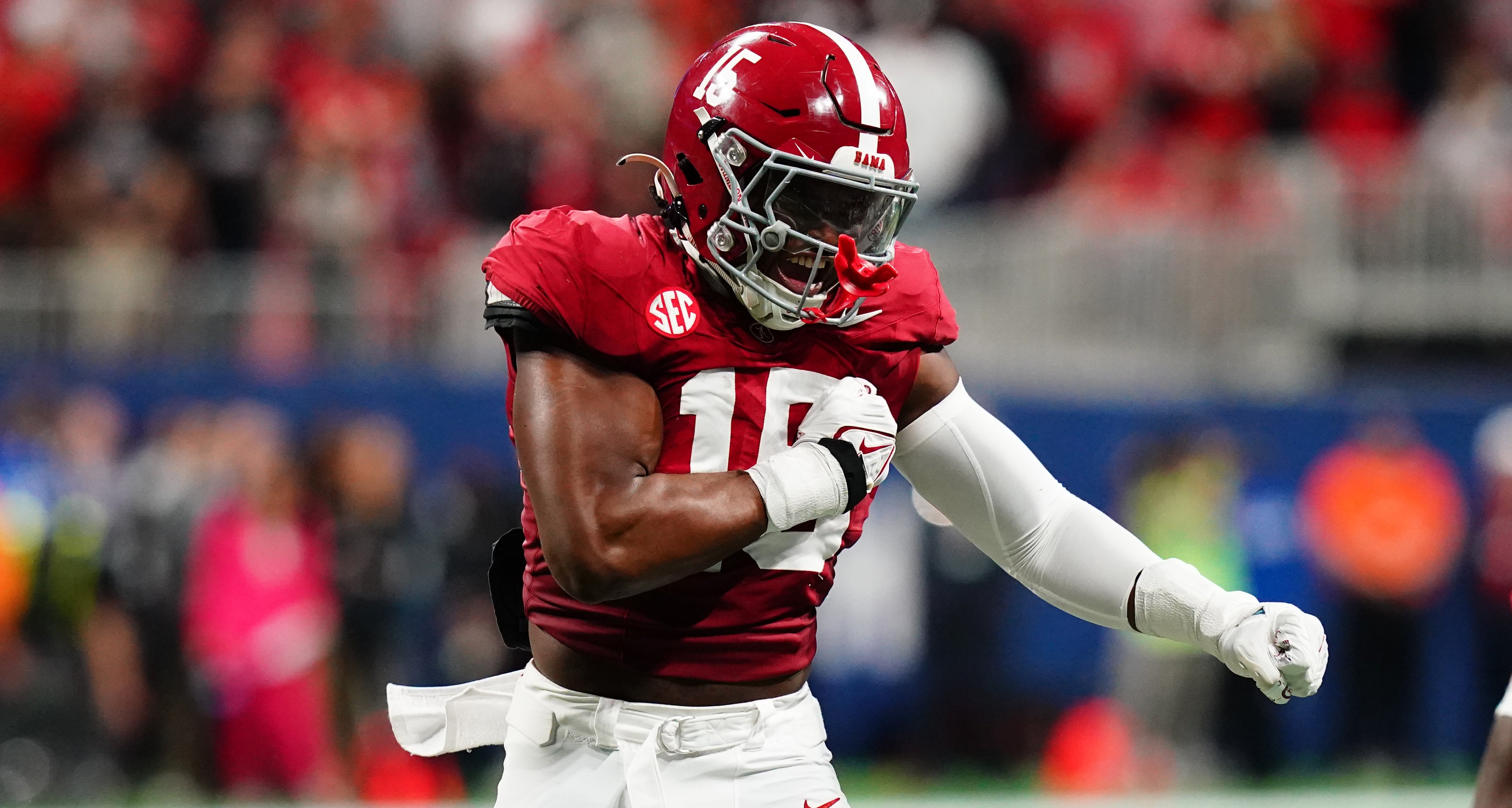 Alabama Crimson Tide linebacker Dallas Turner (15) celebrates after a sack in the second quarter against the Georgia Bulldogs in the SEC Championship at Mercedes-Benz Stadium.