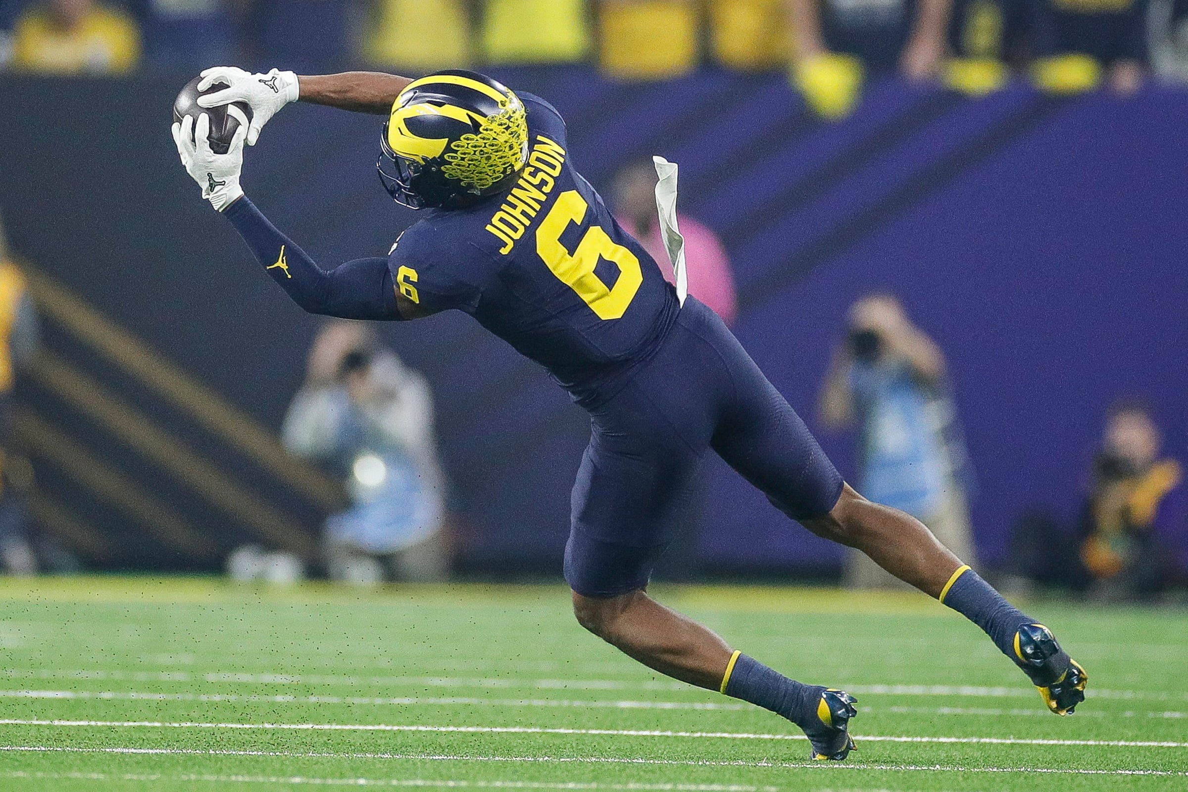 Michigan wide receiver Cornelius Johnson makes a catch against Washington during the first half of the national championship game at NRG Stadium in Houston, Texas on Monday, Jan. 8, 2024.