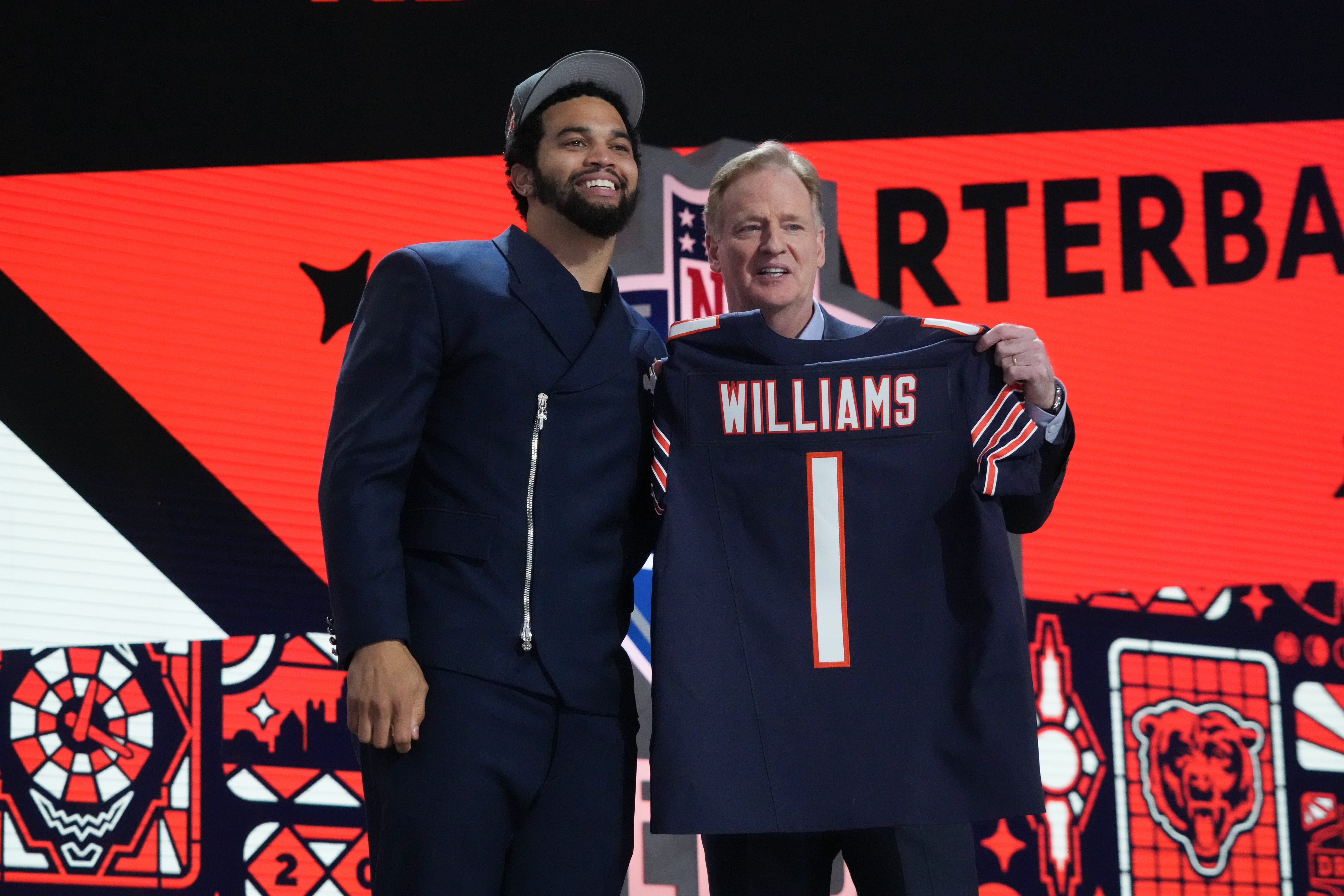 Apr 25, 2024; Detroit, MI, USA; Southern California Trojans quarterback Caleb Williams poses with NFL commissioner Roger Goodell after being selected by the Chicago Bears as the No. 1 pick in the first round of the 2024 NFL Draft at Campus Martius Park and Hart Plaza.