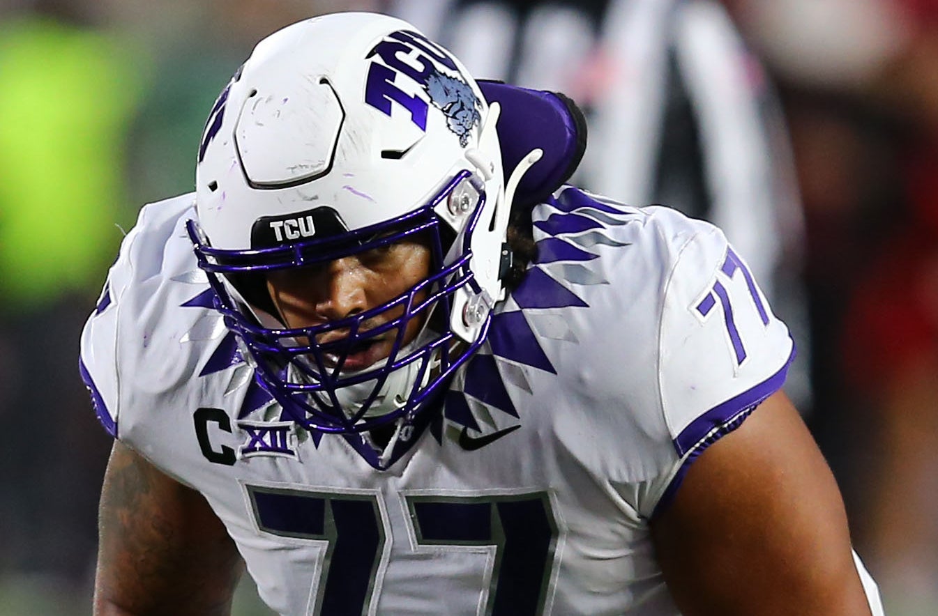 Nov 2, 2023; Lubbock, Texas, USA; Texas Christian Horned Frogs offensive tackle Brandon Coleman (77) prepares to run a play against the Texas Tech Red Raiders in the second half at Jones AT&T Stadium and Cody Campbell Field.