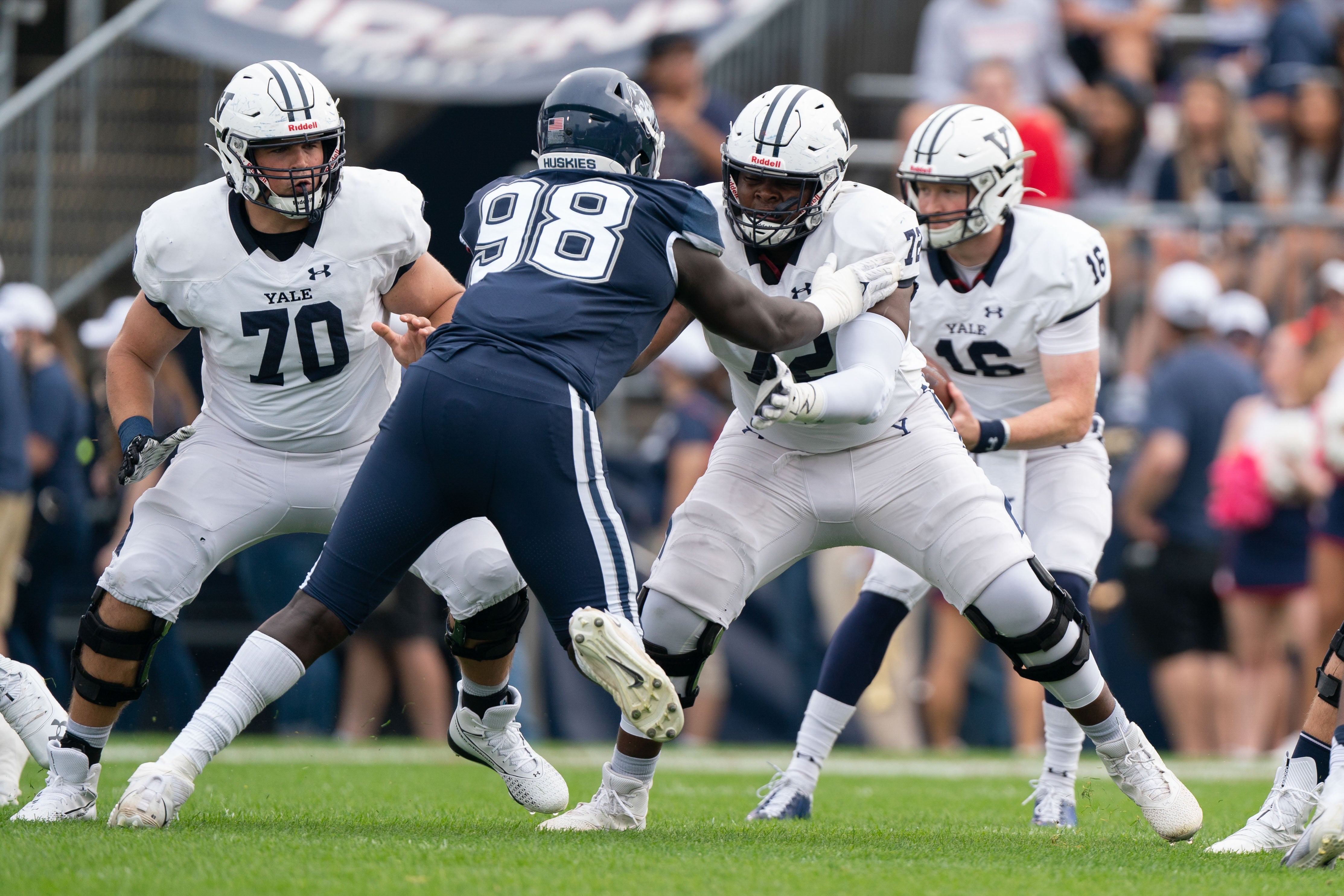Oct 16, 2021; East Hartford, Connecticut, USA; Yale Bulldogs offensive lineman Kiran Amegadjie (72) blocks Connecticut Huskies defensive lineman Lwal Uguak (98) during the first half at Rentschler Field at Pratt & Whitney Stadium.