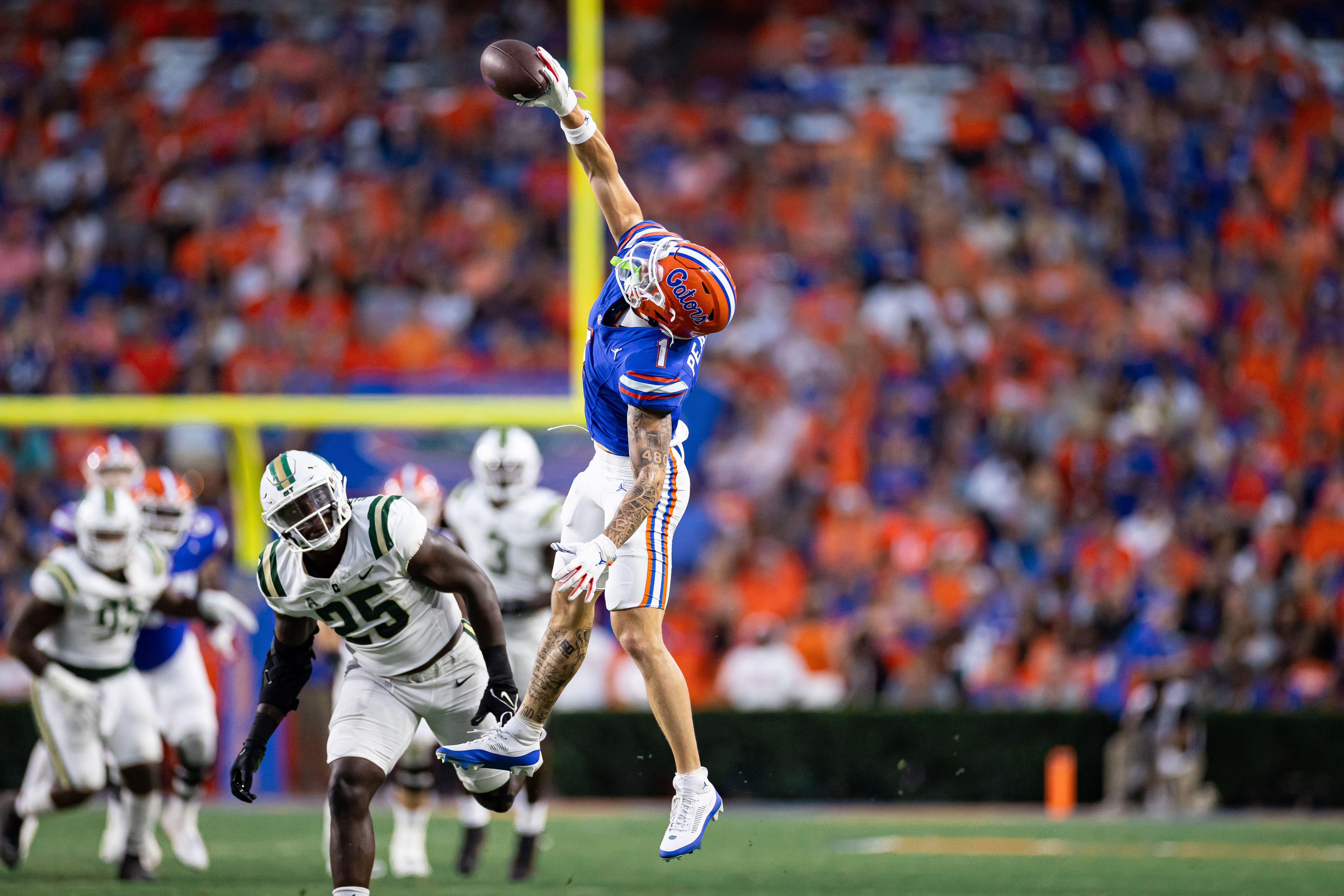 Florida Gators wide receiver Ricky Pearsall (1) makes a one-handed catch for a first down during the first half against the Charlotte 49ers at Steve Spurrier Field at Ben Hill Griffin Stadium in Gainesville, FL on Saturday, September 23, 2023.