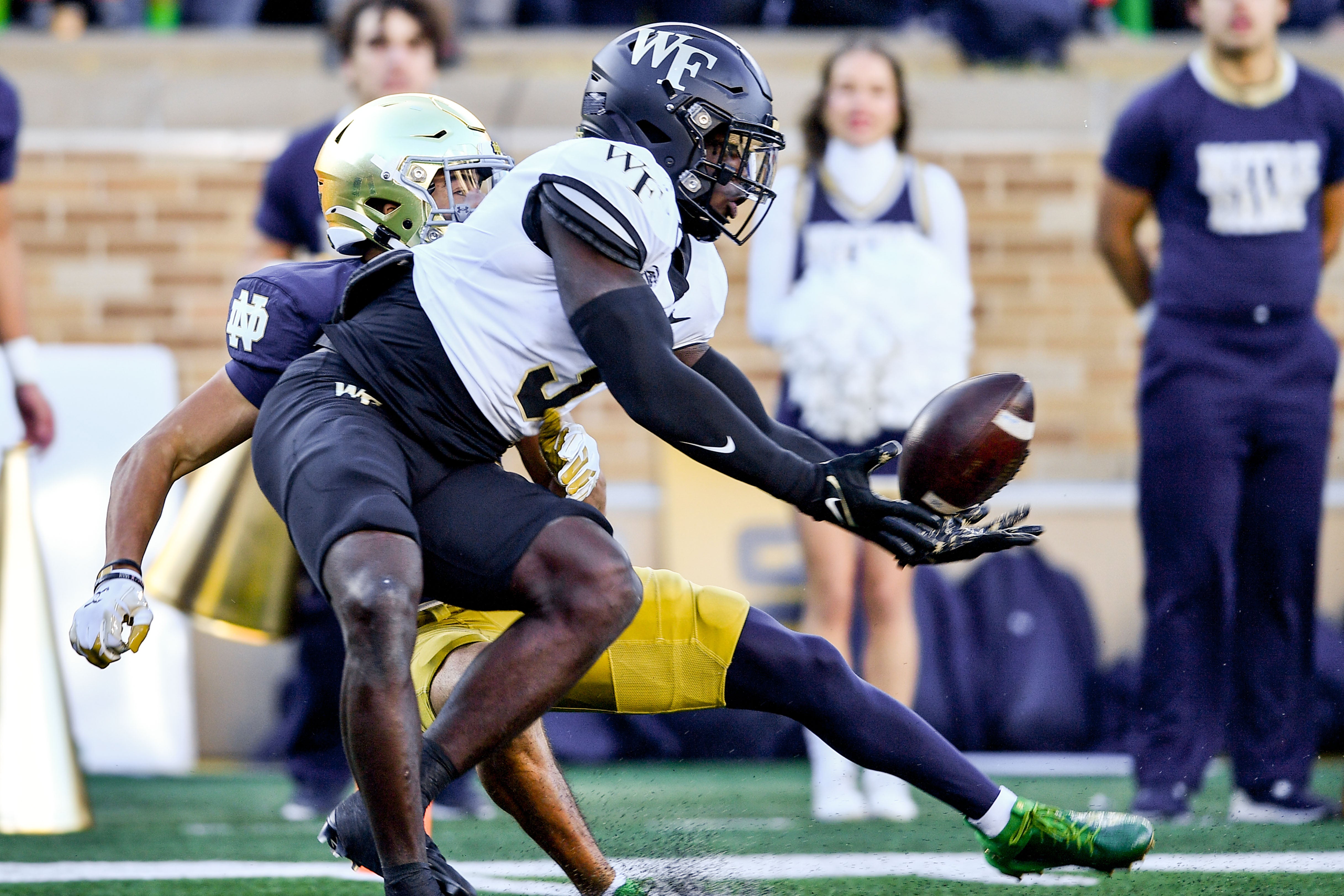 Nov 18, 2023; South Bend, Indiana, USA; Wake Forest Demon Deacons safety Malik Mustapha (3) breaks up a pass intended for Notre Dame Fighting Irish wide receiver Jordan Faison (80) in the first quarter at Notre Dame Stadium.