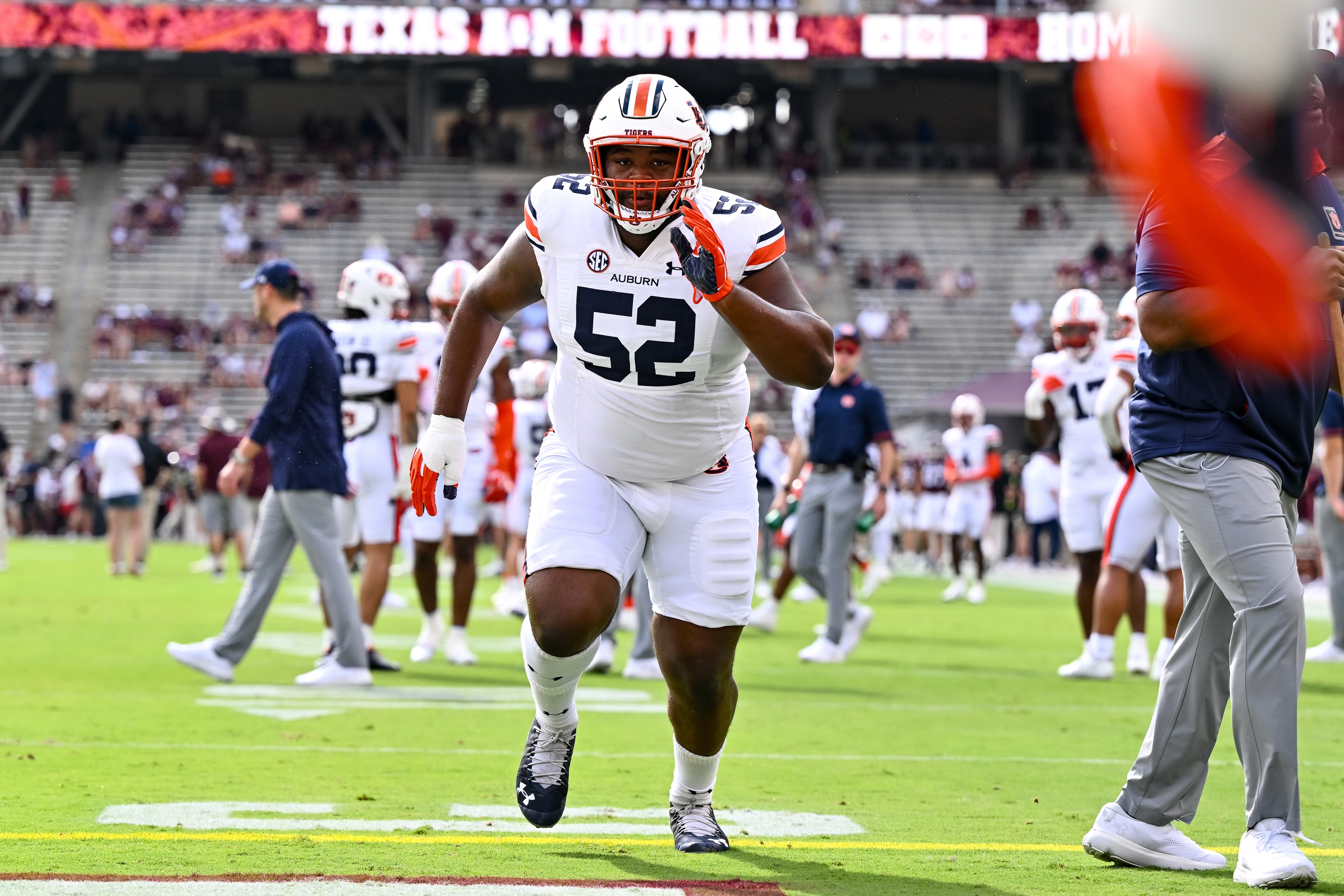 Auburn Tigers defensive lineman Justin Rogers (52) warms up prior to the game against the Texas A&M Aggies at Kyle Field.