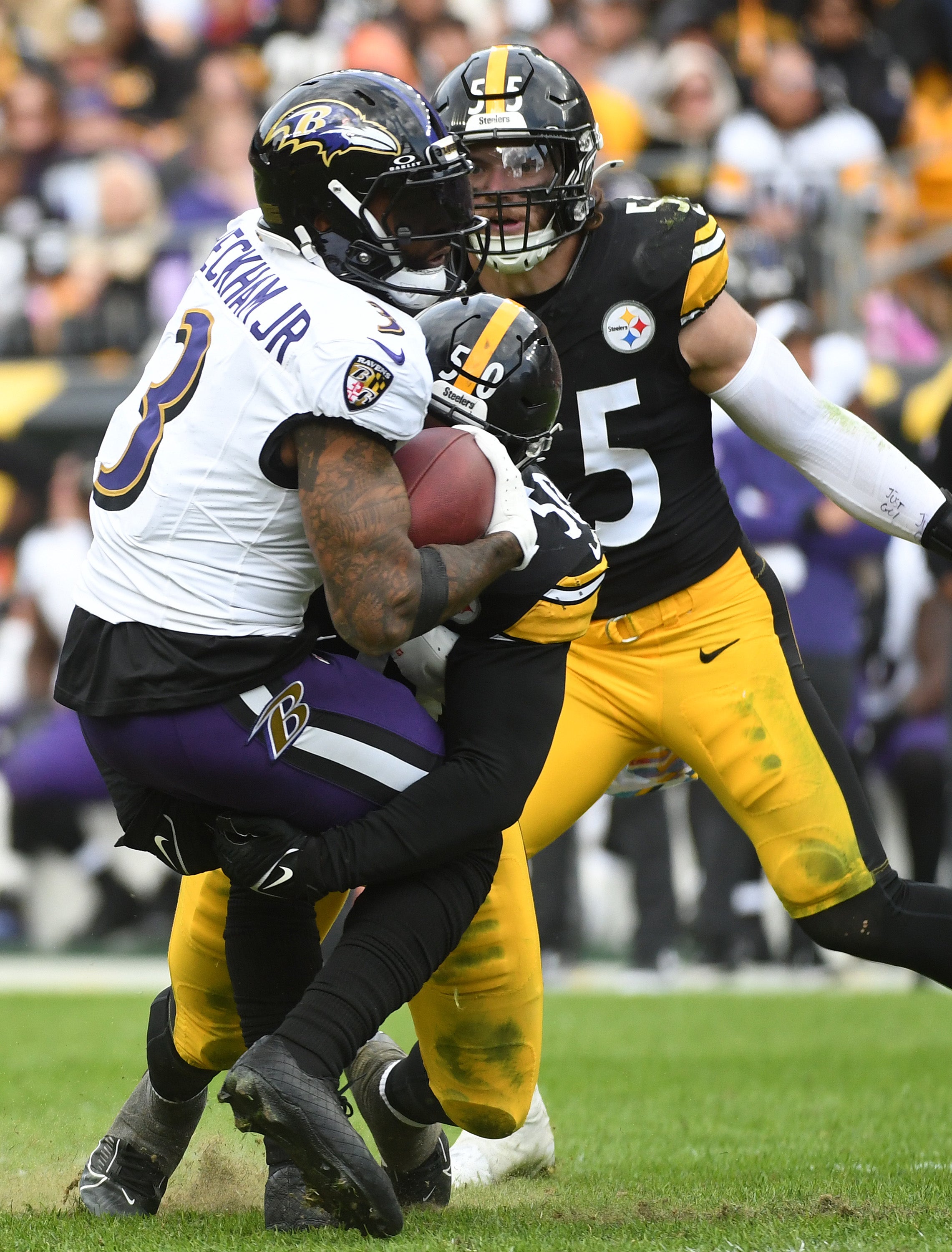 Oct 8, 2023; Pittsburgh, Pennsylvania, USA; Baltimore Ravens wide receiver Odell Beckham Jr. (3) is tackled by Pittsburgh Steelers linebacker Elandon Roberts (50) as linebacker Cole Holcomb (55) closes in on the play during the fourth quarter at Acrisure Stadium. The Steelers won 17-10. Mandatory Credit: Philip G. Pavely-USA TODAY Sports  