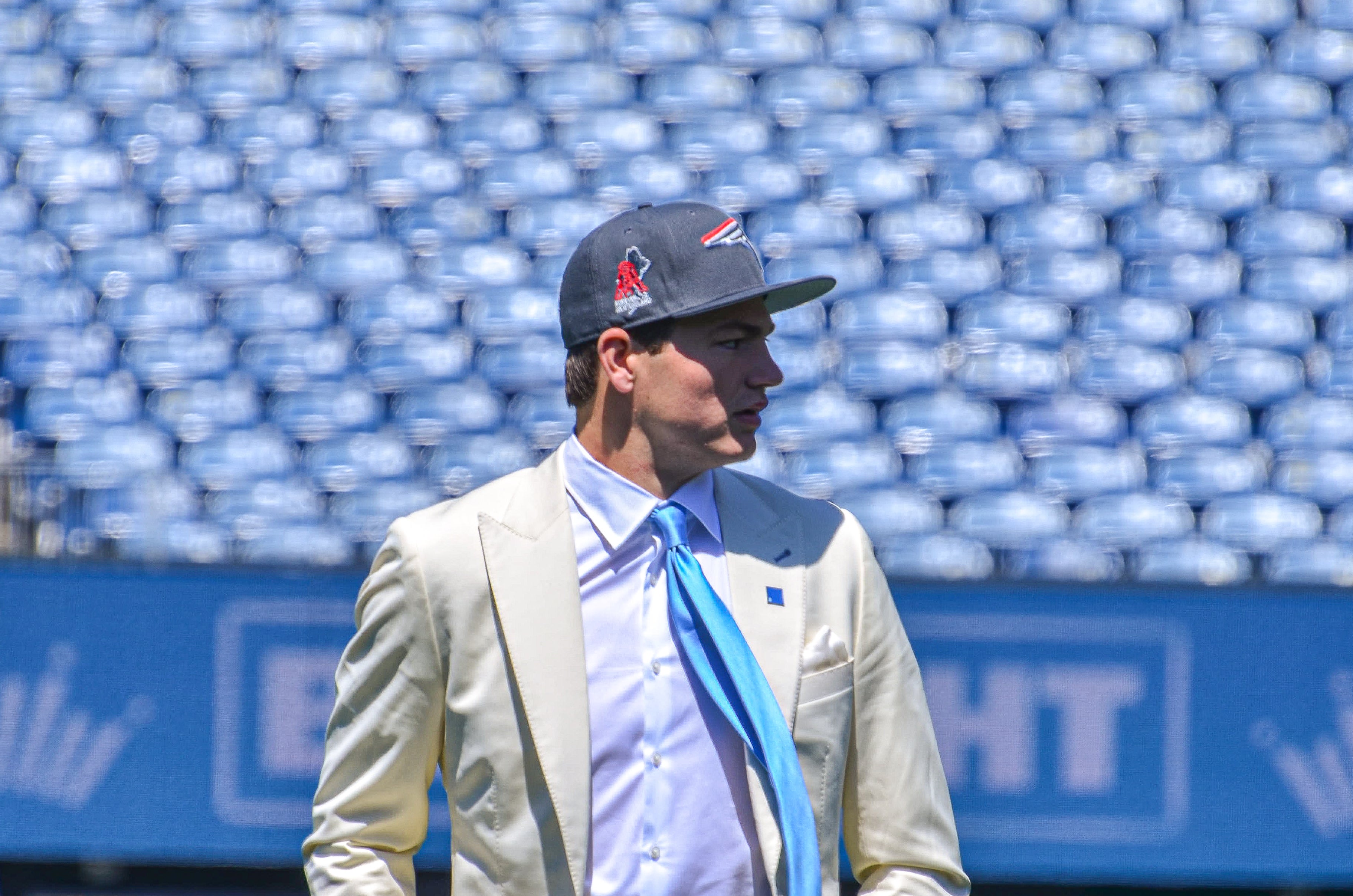 Drake Maye walks on the field at Gillette Stadium with his Patriots hat | Friday, April 26