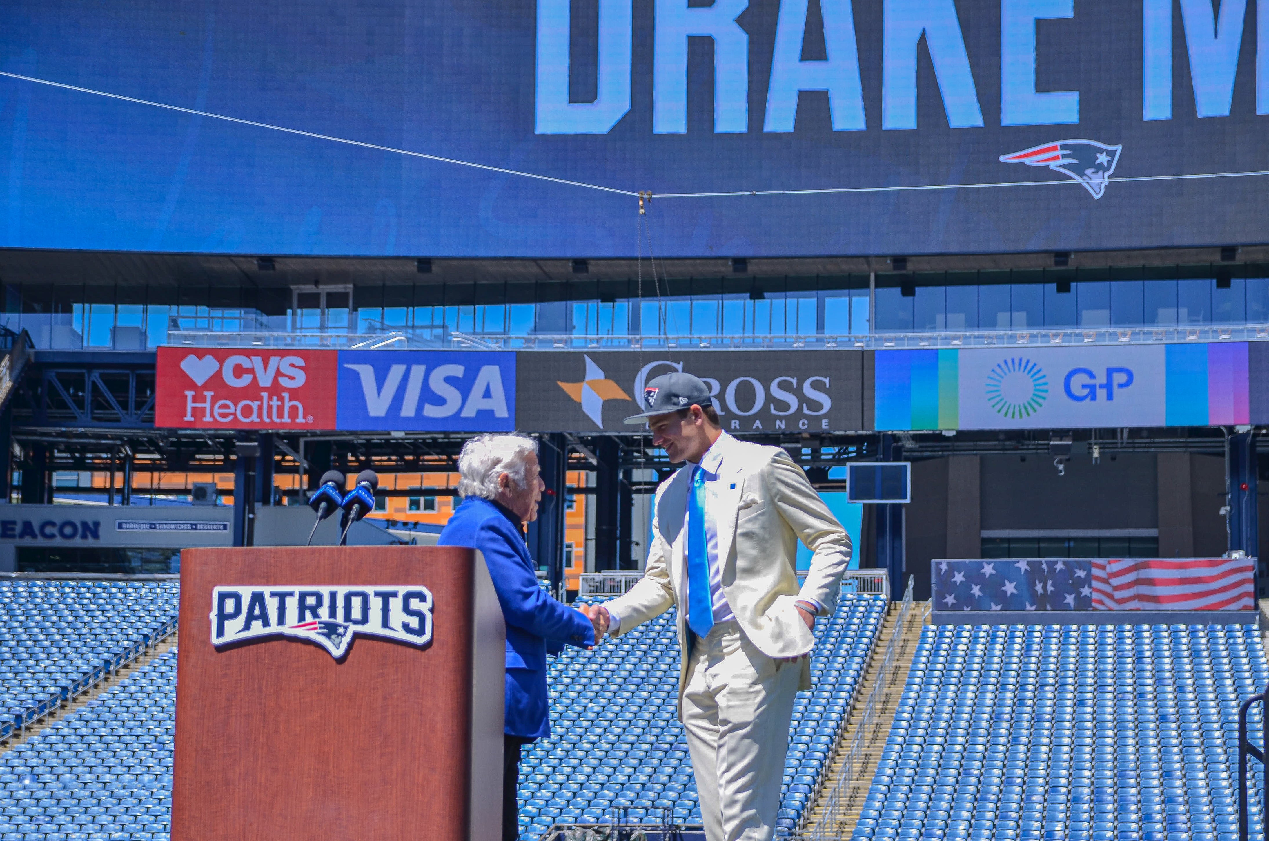Drake Maye shakes Robert Kraft's hand at Gillette Stadium on Friday, April 26