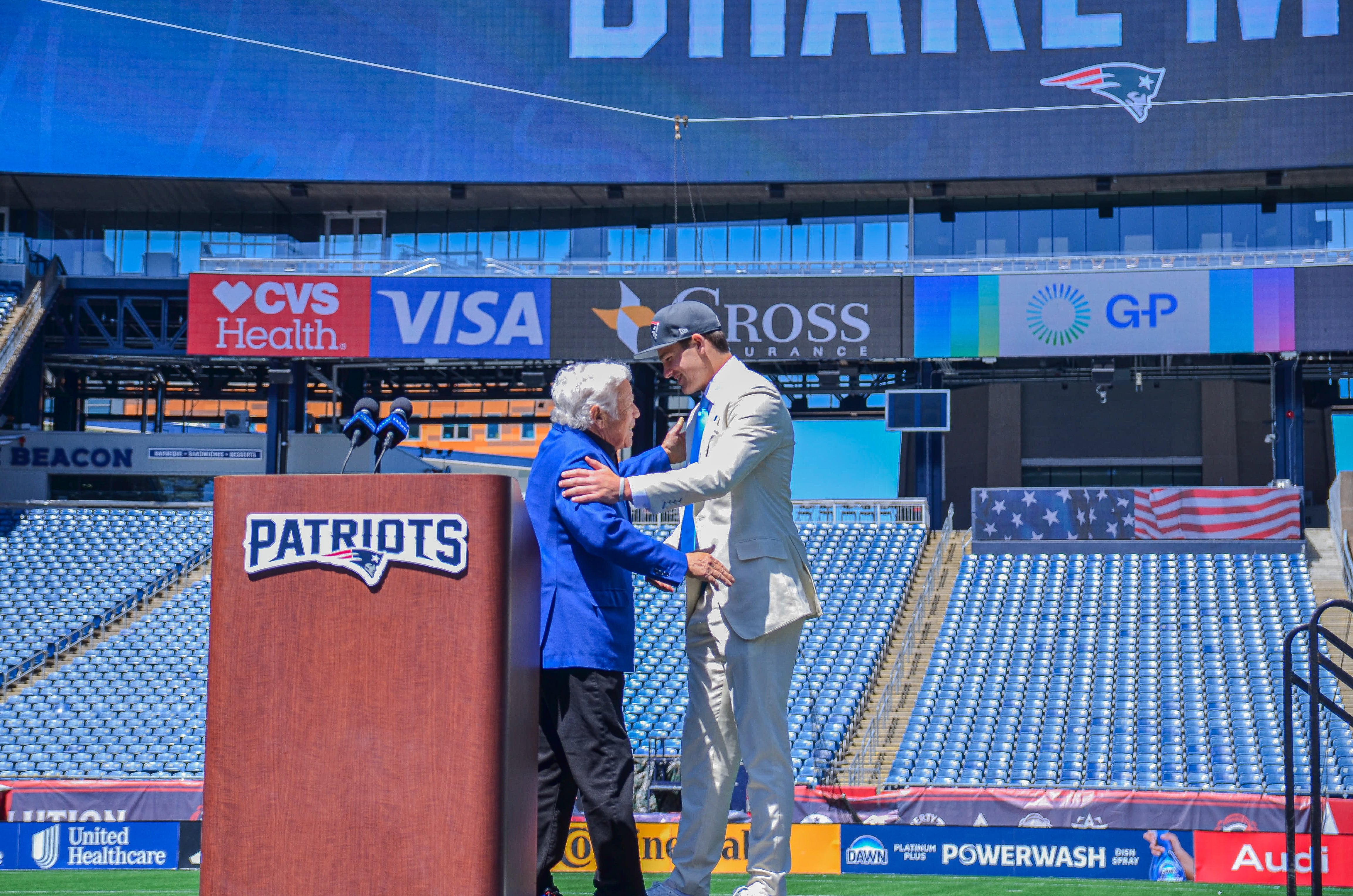 Drake Maye embraces Robert Kraft at Gillette Stadium on Friday, April 26