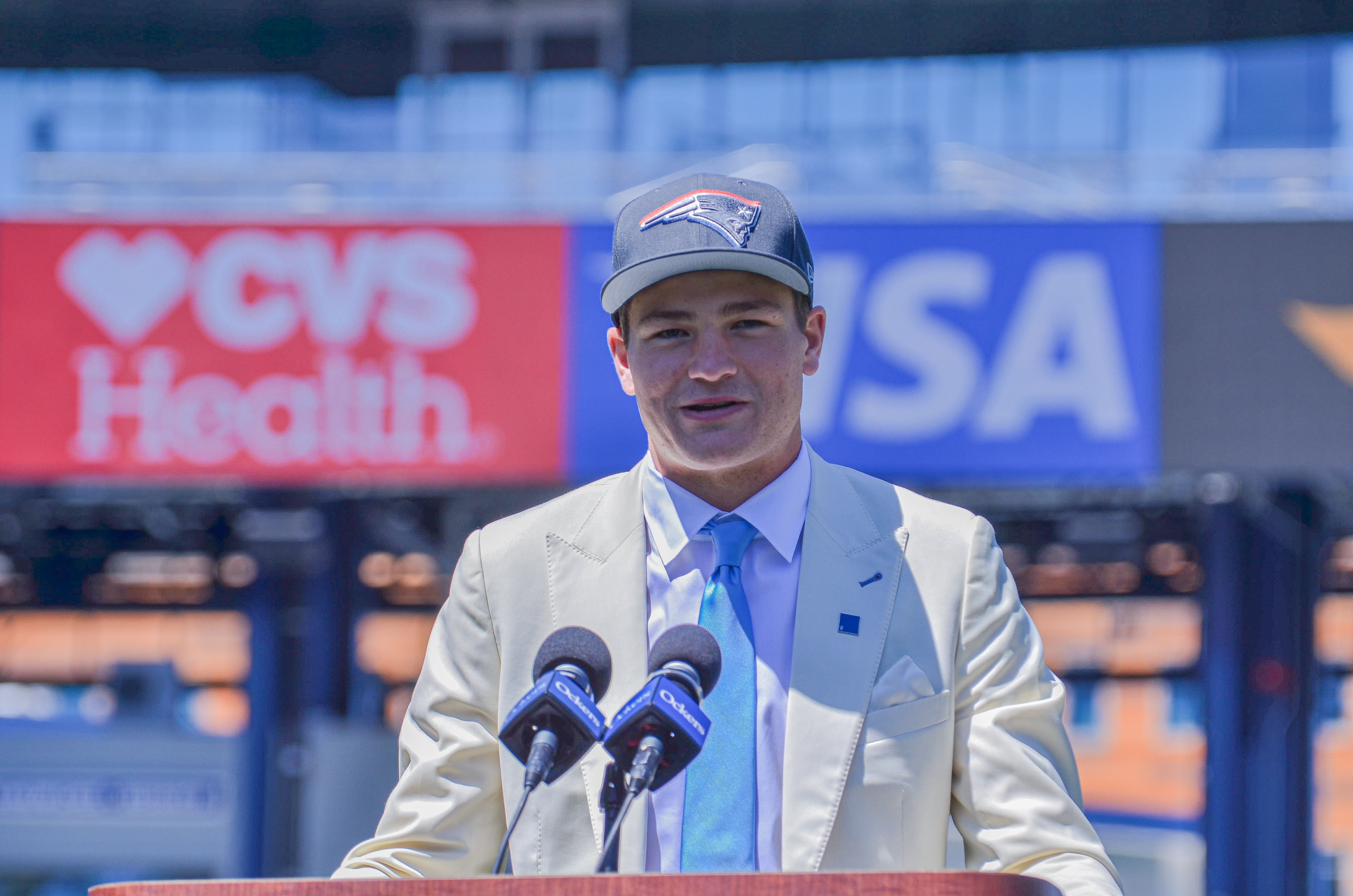 Drake Maye speaks with reporters at Gillette Stadium after accepting his jersey on Friday, April 26