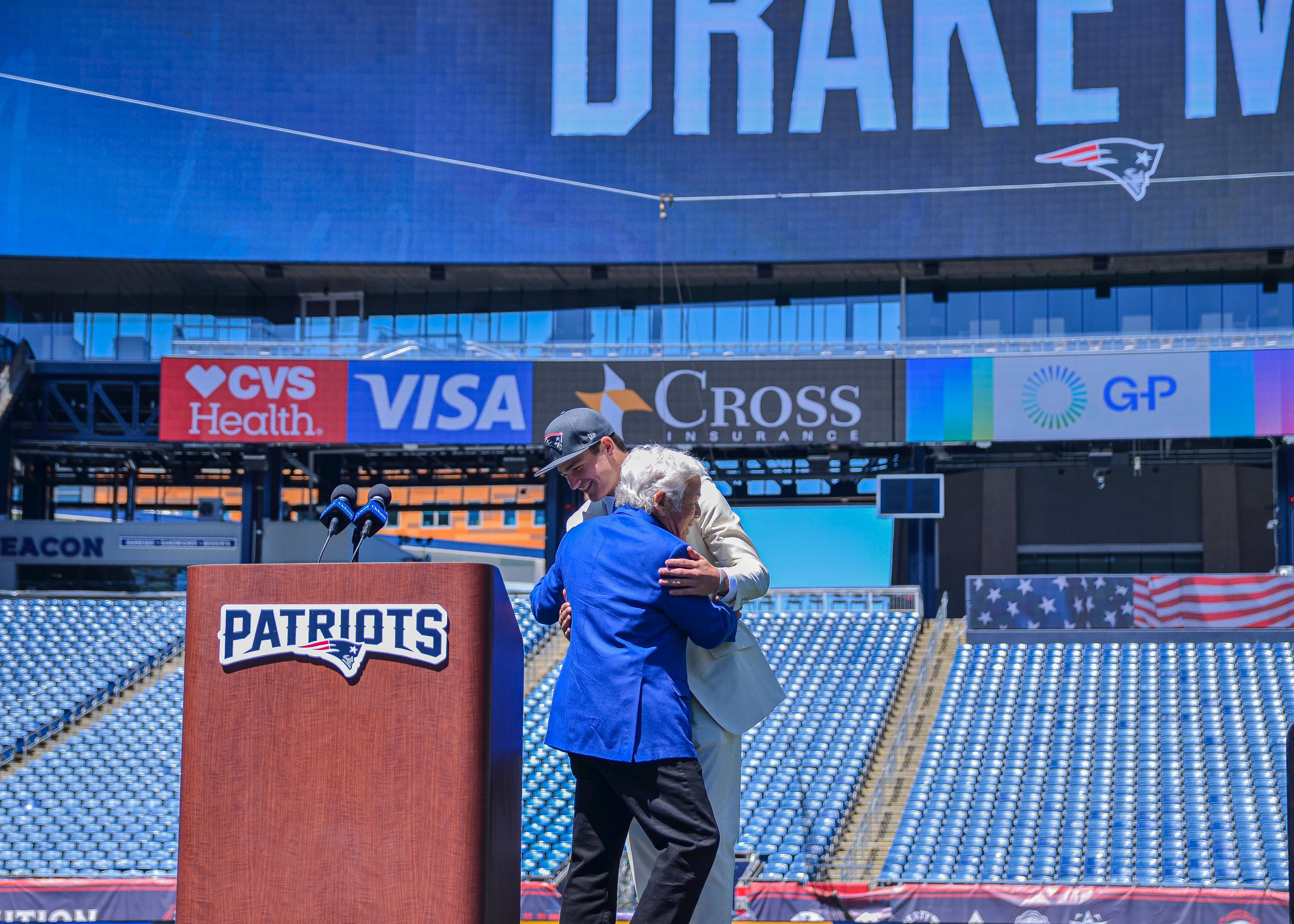 Drake Maye embraces Robert Kraft at Gillette Stadium on Friday, April 26