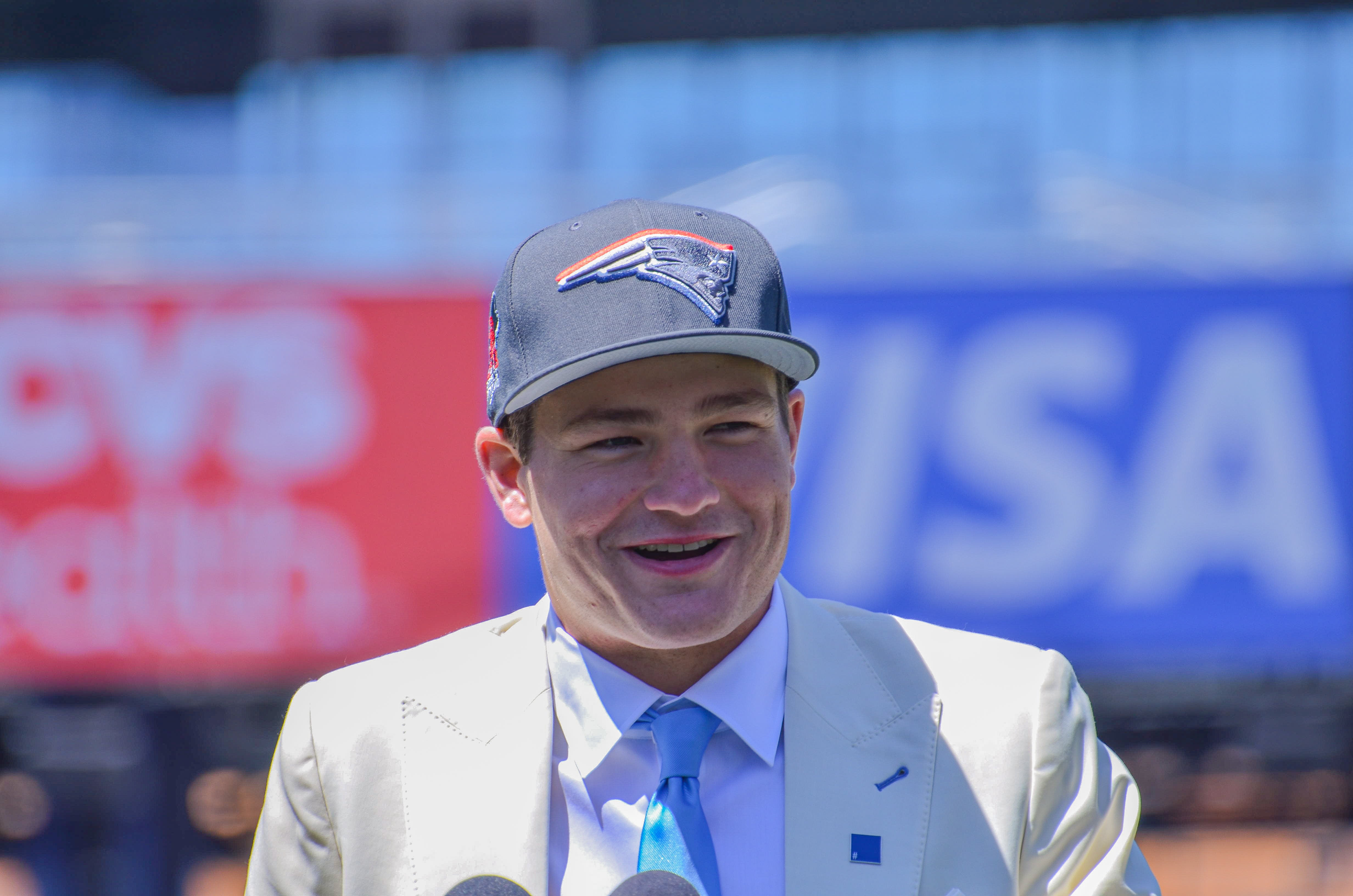 Drake Maye speaks with reporters at Gillette Stadium after accepting his jersey on Friday, April 26