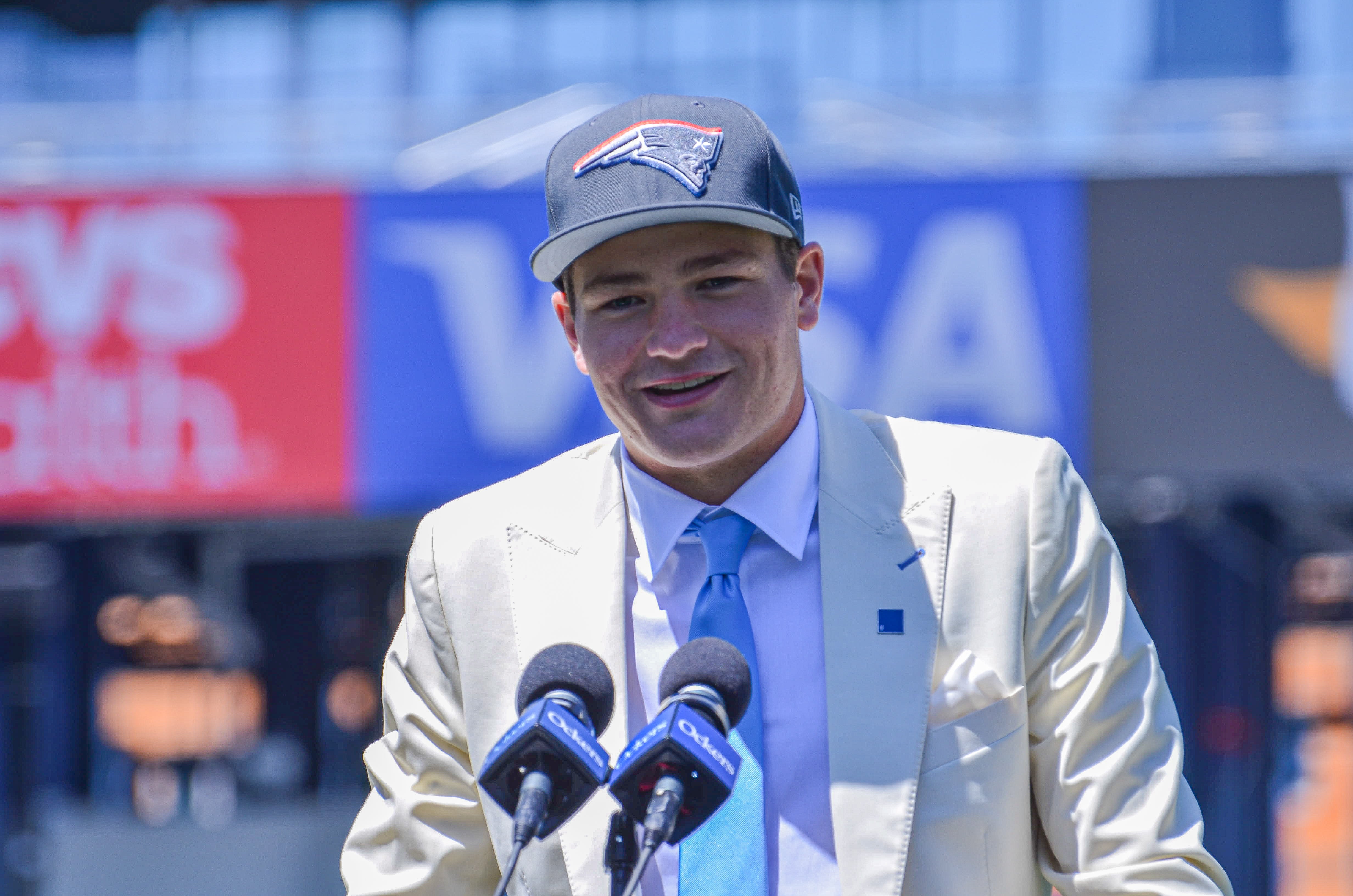 Drake Maye speaks with reporters at Gillette Stadium after accepting his jersey on Friday, April 26