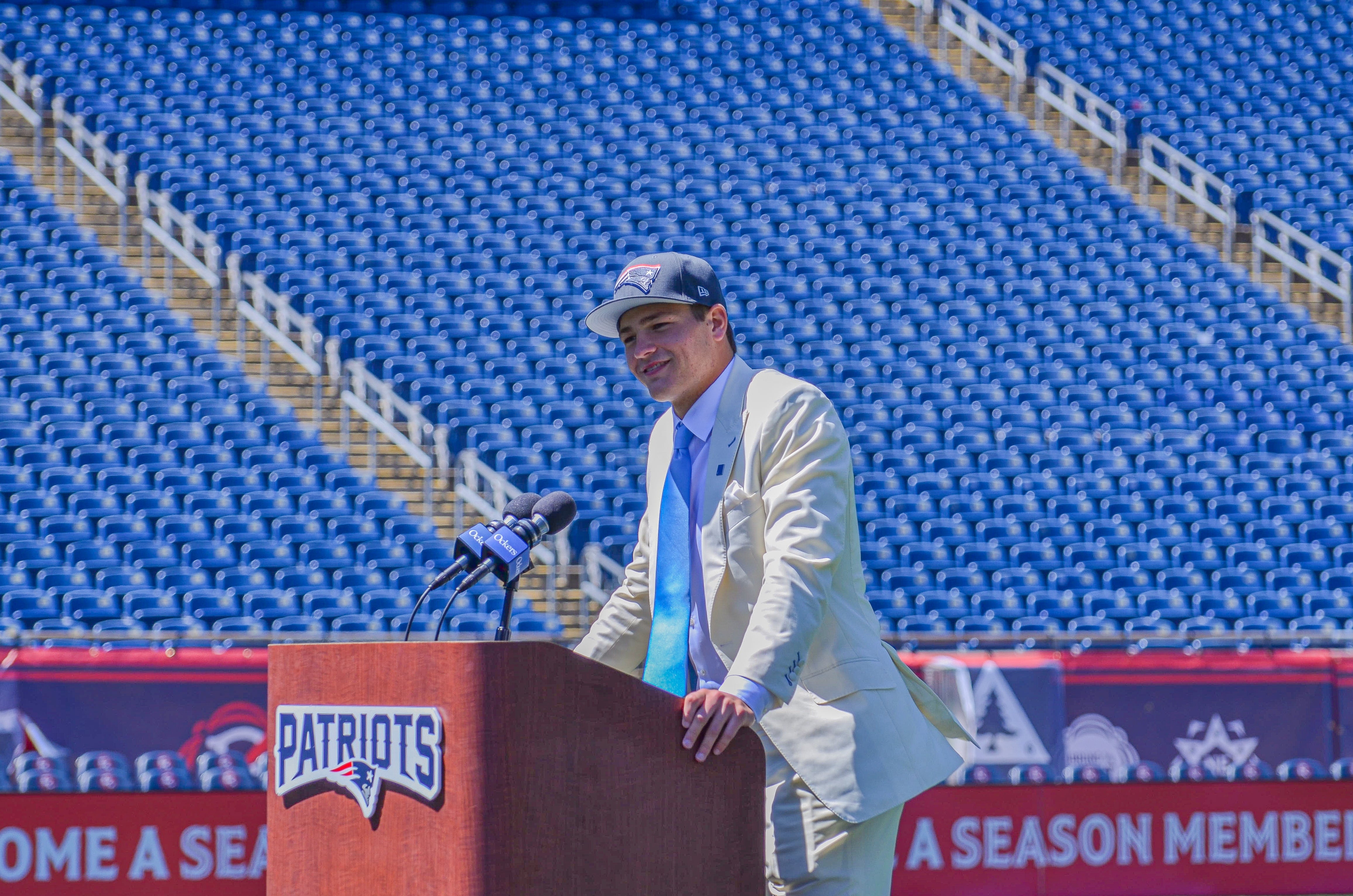 Drake Maye speaks with reporters at Gillette Stadium after accepting his jersey on Friday, April 26