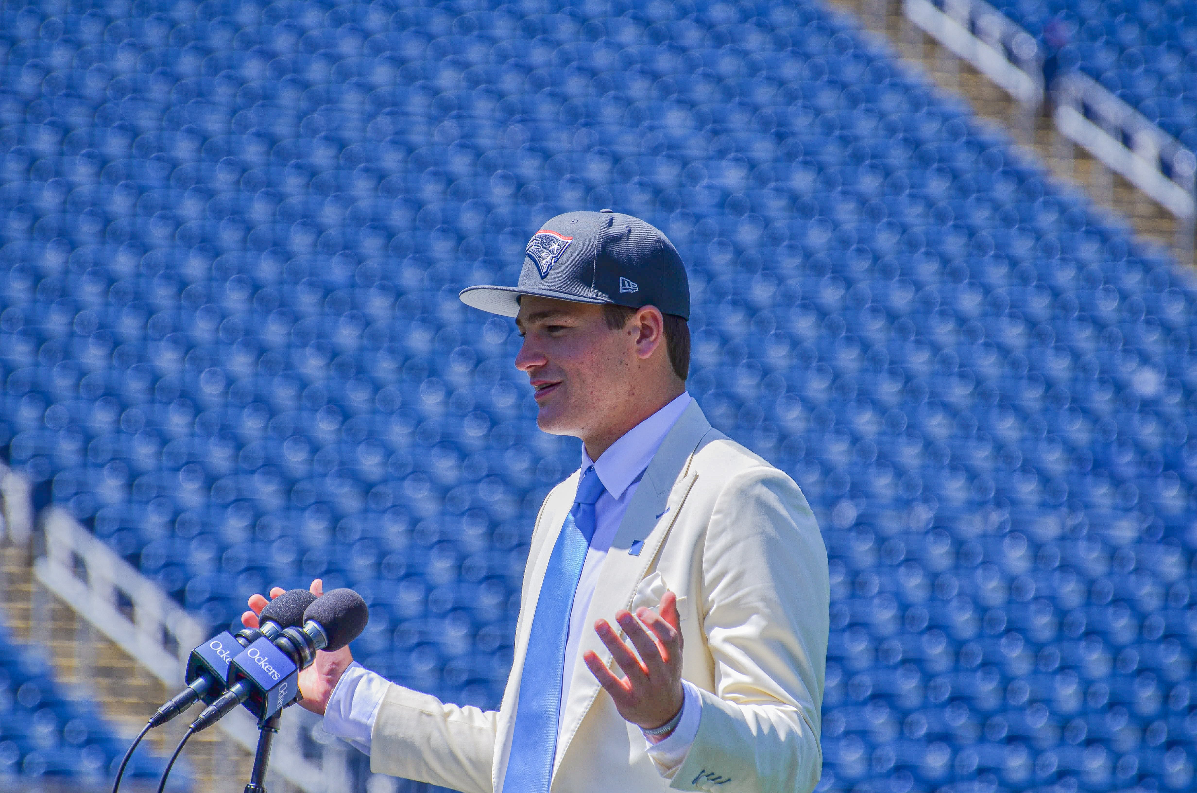 Drake Maye speaks with reporters at Gillette Stadium after accepting his jersey on Friday, April 26