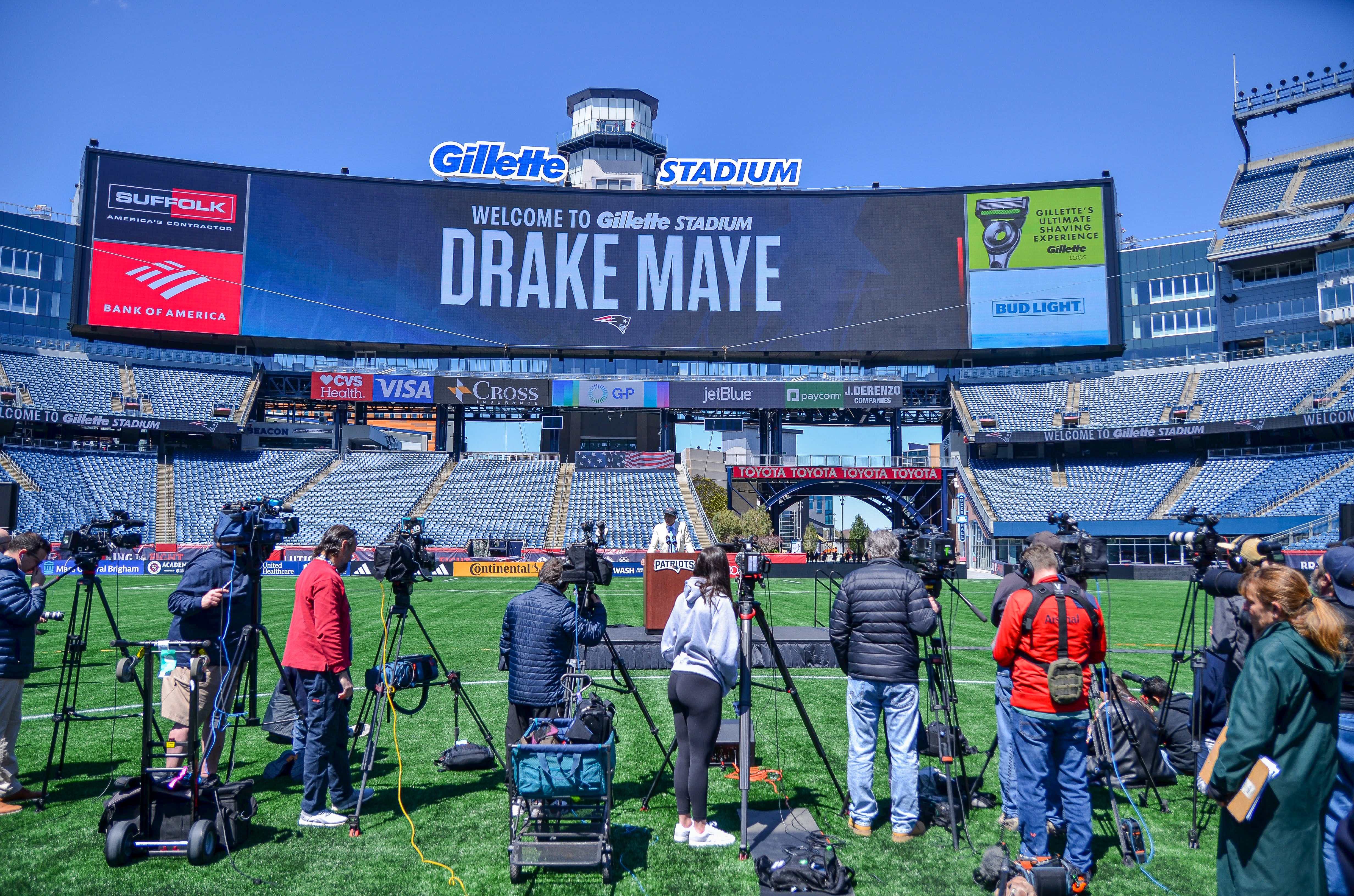 Drake Maye speaks with reporters at Gillette Stadium after accepting his jersey on Friday, April 26