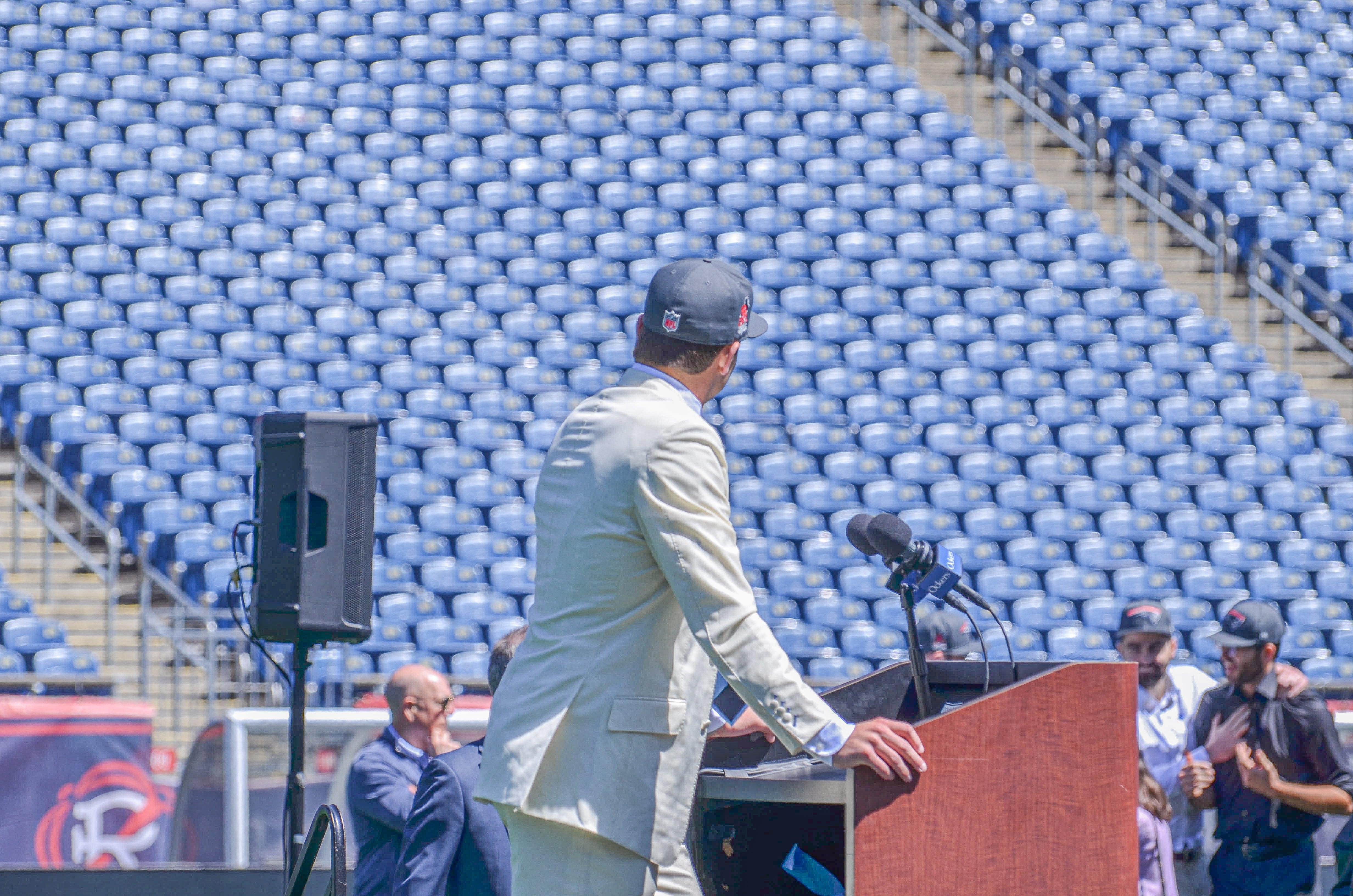 Drake Maye speaks with reporters at Gillette Stadium after accepting his jersey on Friday, April 26