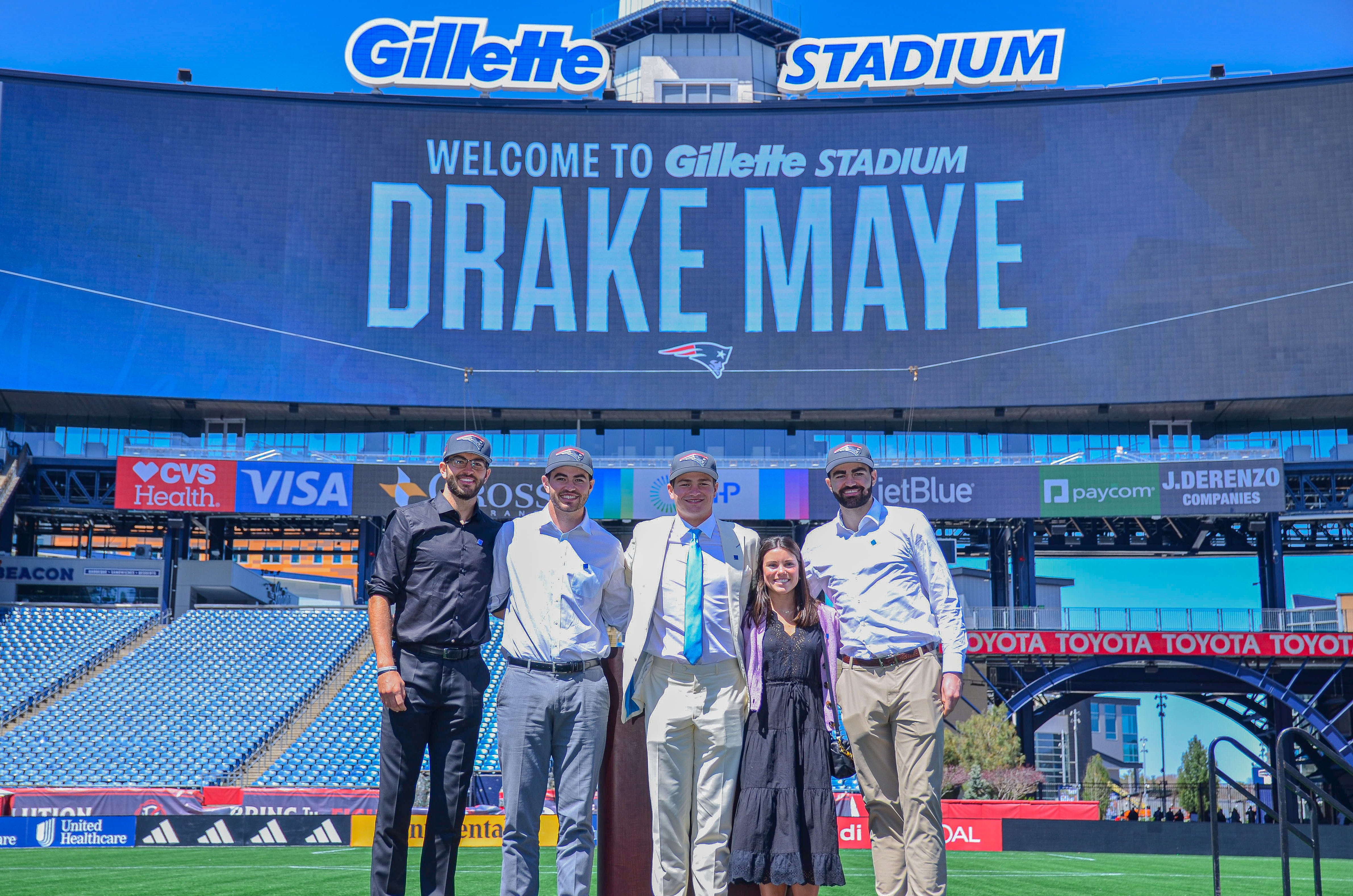 Drake Maye poses with his family at Gillette Stadium (from left to right: Bo, Cole, Joann-Michael, Luke) | Friday, April 26