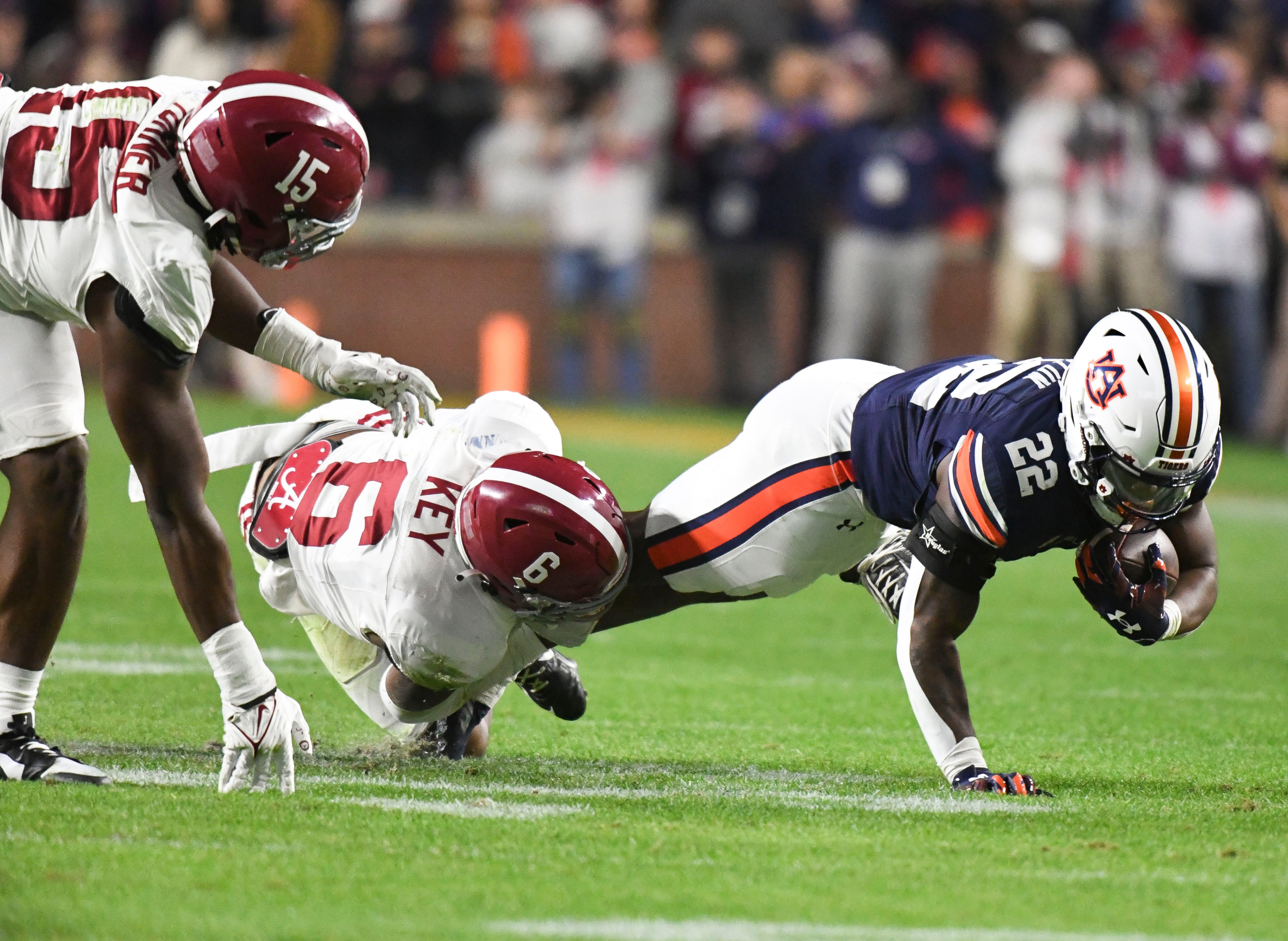 Alabama Crimson Tide defensive back Jaylen Key (6) brings down Auburn Tigers running back Damari Alston (22) at Jordan-Hare Stadium. Alabama won 27-24.