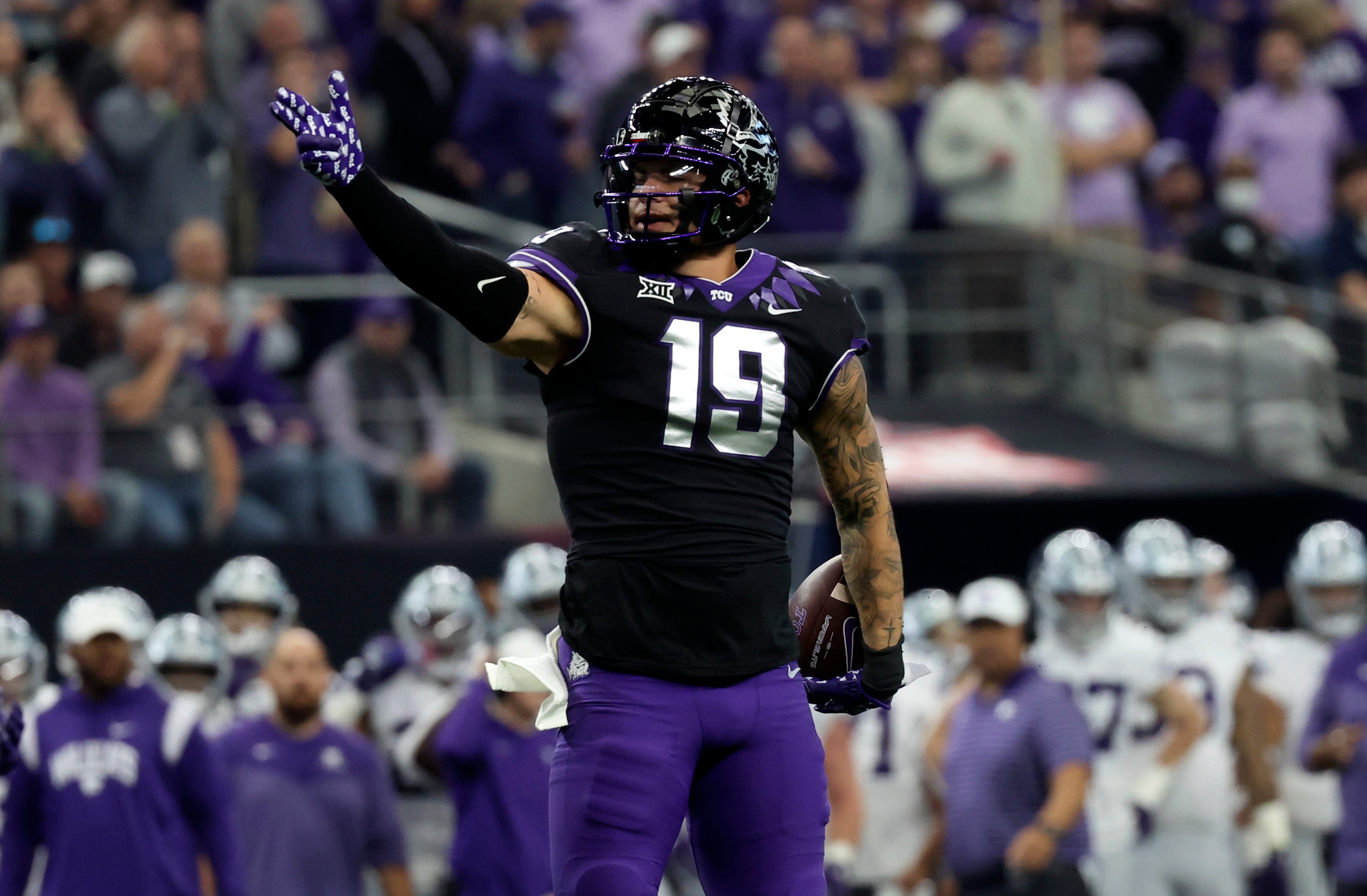 Dec 3, 2022; Arlington, TX, USA; TCU Horned Frogs tight end Jared Wiley (19) reacts after a catch during the first quarter against the Kansas State Wildcats at AT&T Stadium.
