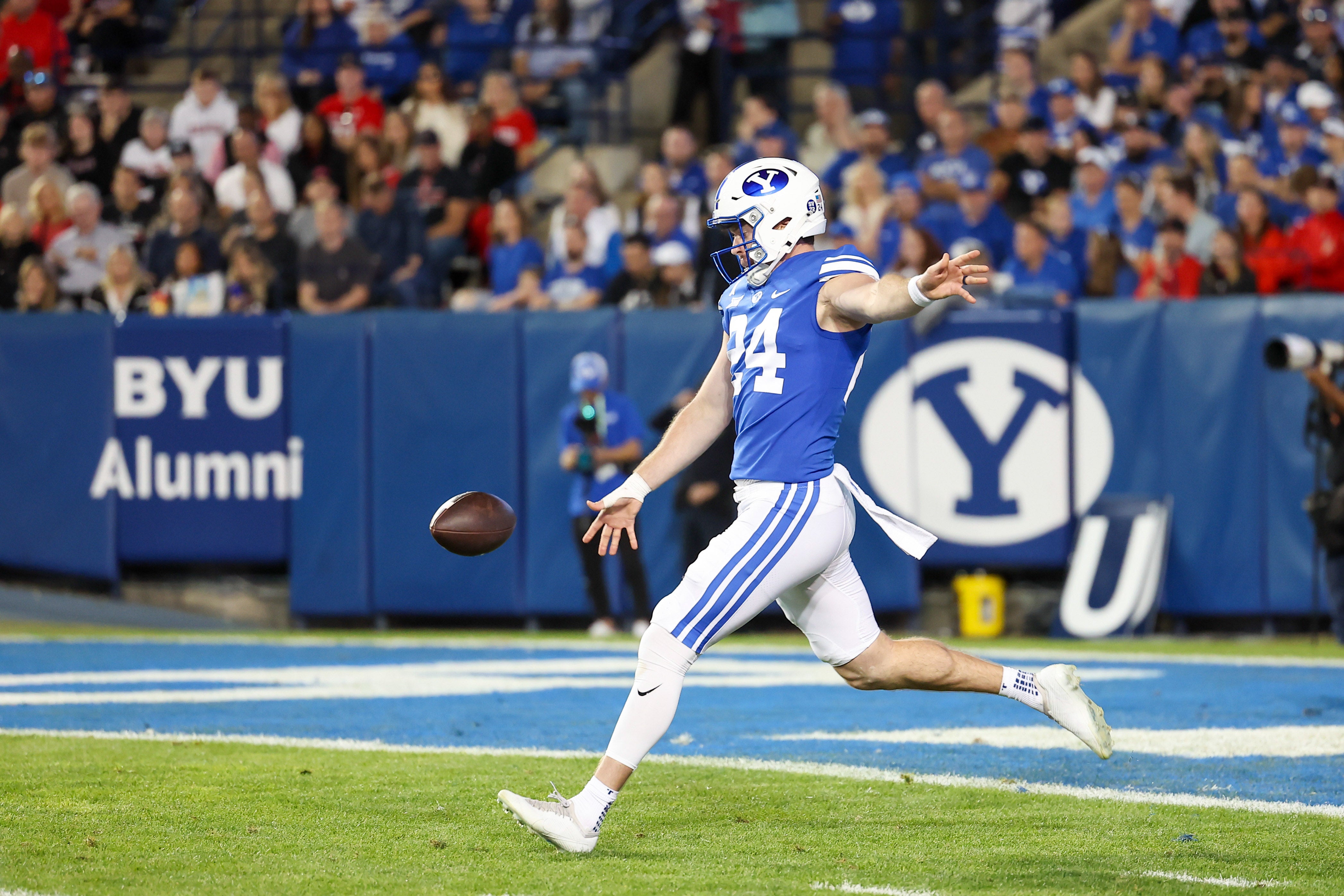 Oct 21, 2023; Provo, Utah, USA; Brigham Young Cougars punter Ryan Rehkow (24) punts the ball against the Texas Tech Red Raiders in the first half at LaVell Edwards Stadium.
