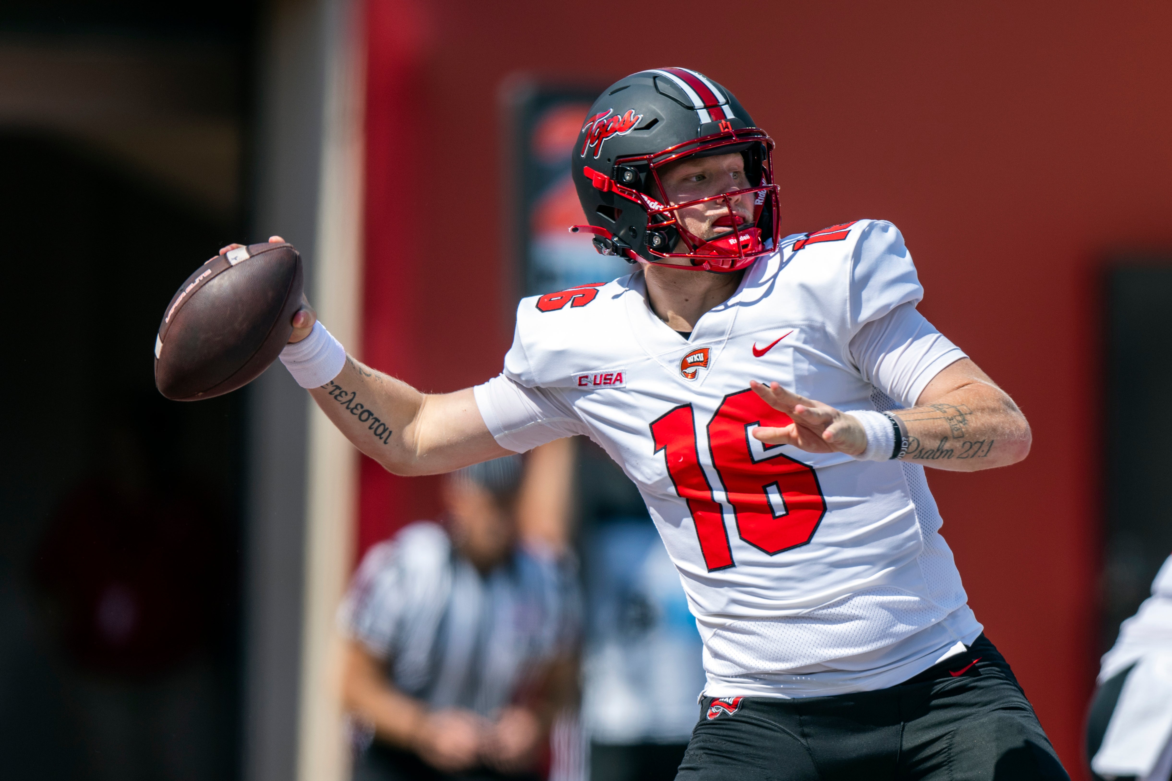 Sep 17, 2022; Bloomington, Indiana, USA; Western Kentucky Hilltoppers quarterback Austin Reed (16) throws a pass during the second quarter against the Indiana Hoosiers at Memorial Stadium.