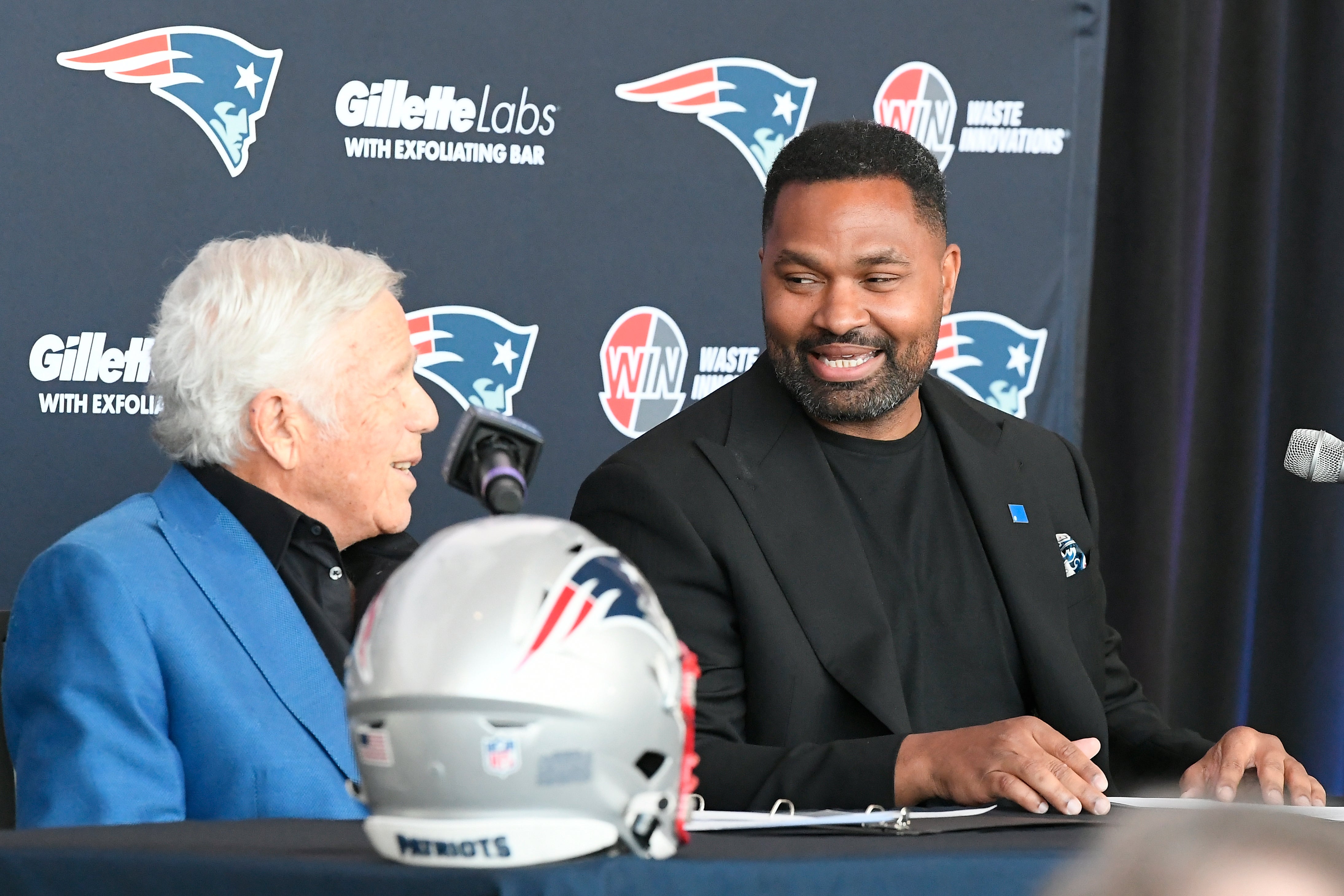Jan 17, 2024; Foxborough, MA, USA; New England Patriots owner Robert Kraft (left) announces the hiring of head coach Jerod Mayo (right) at Gillette Stadium.