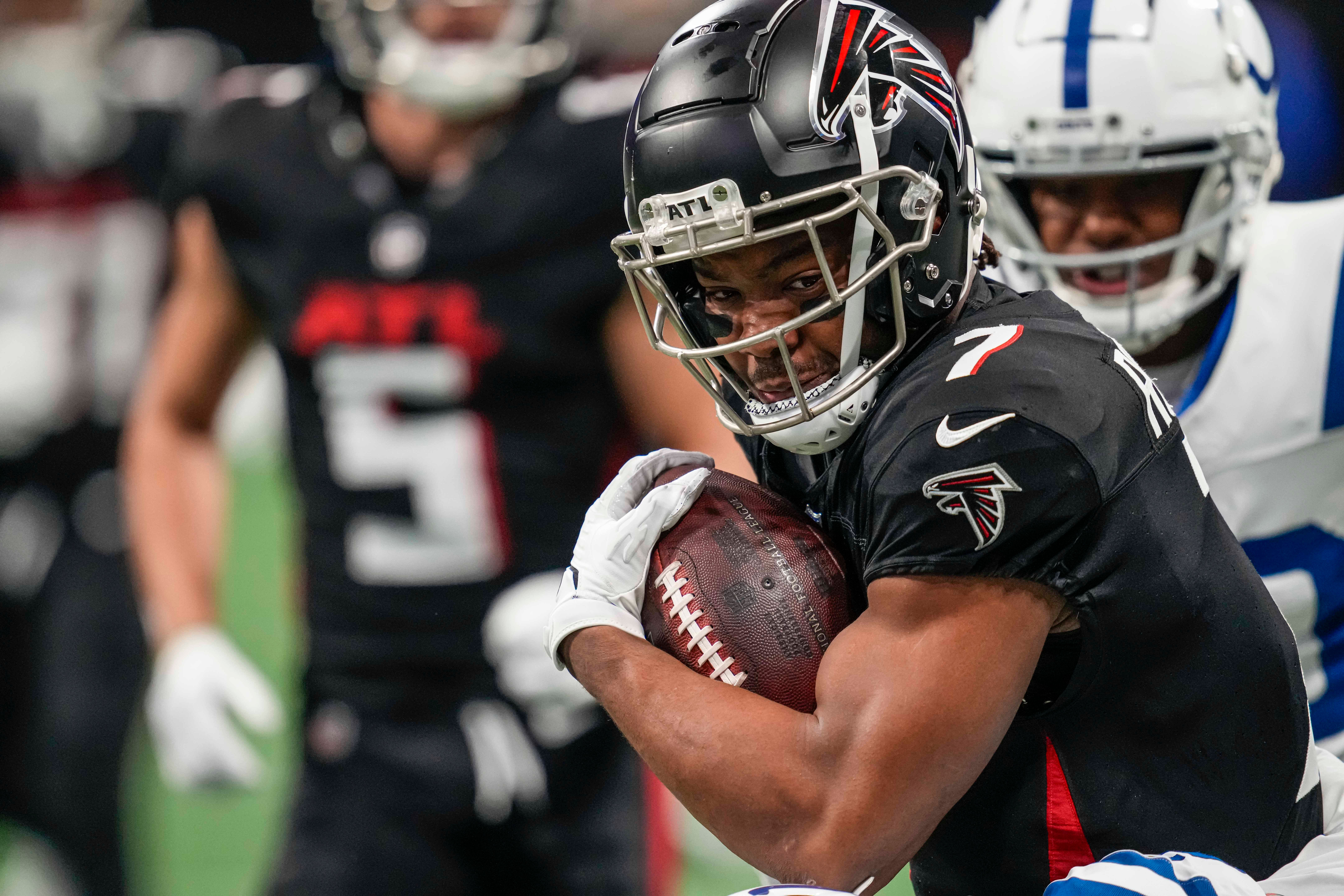 Dec 24, 2023; Atlanta, Georgia, USA; Atlanta Falcons running back Bijan Robinson (7) runs against the Indianapolis Colts at Mercedes-Benz Stadium.