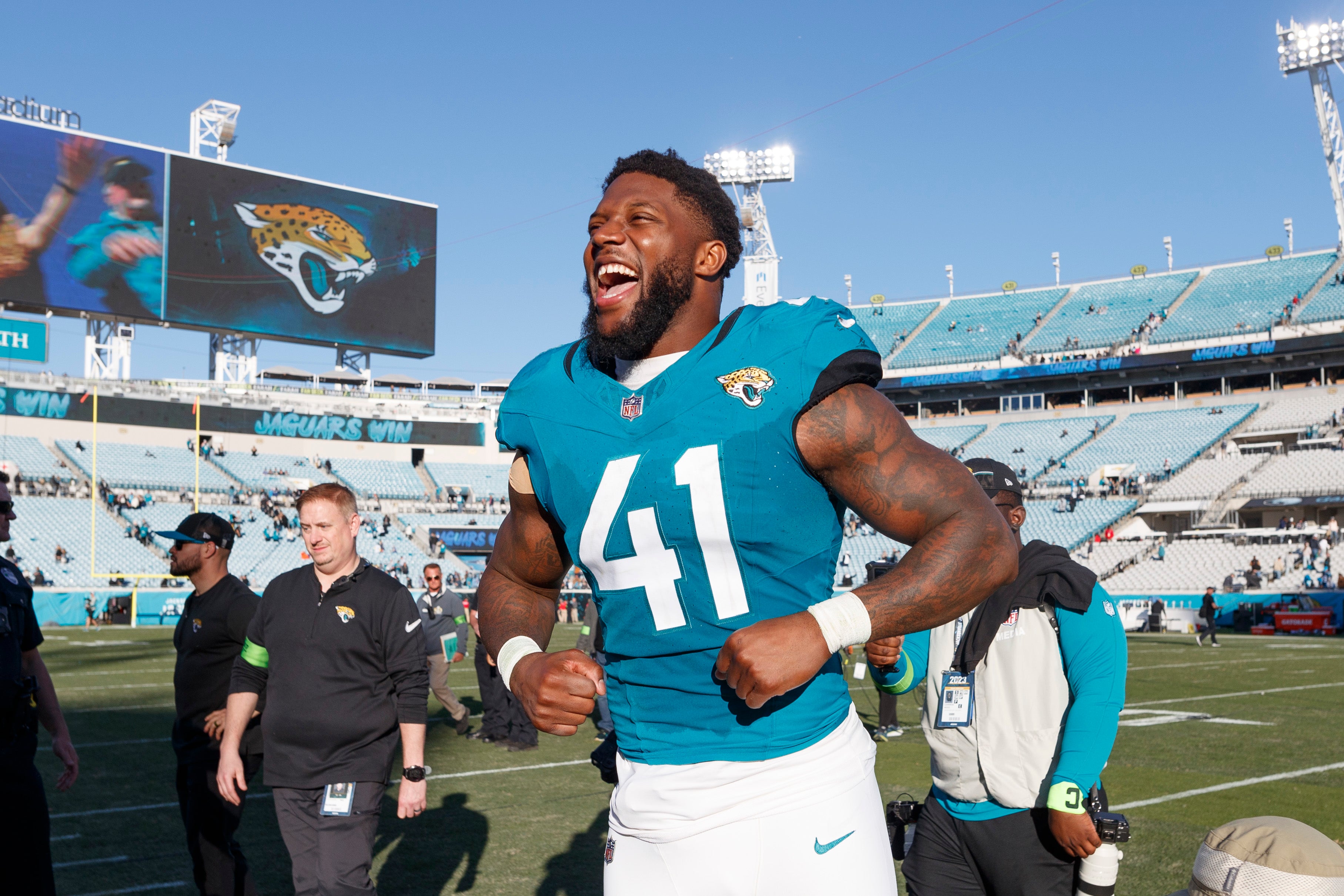 Dec 31, 2023; Jacksonville, Florida, USA; Jacksonville Jaguars outside linebacker Josh Allen (41) celebrates the win against the Carolina Panthers at EverBank Stadium.
