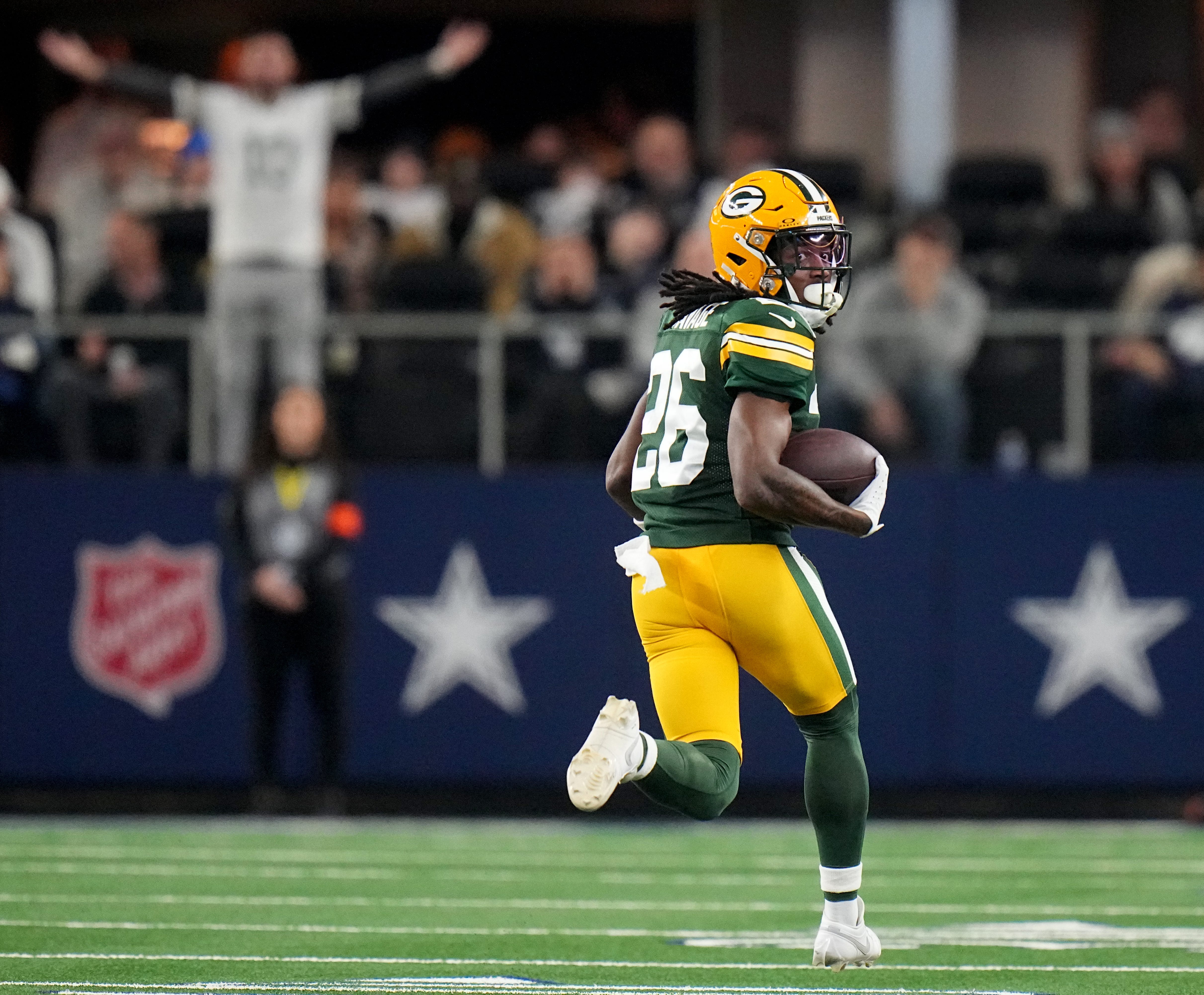 Green Bay Packers safety Darnell Savage (26) returns an interception for a touchdown during the second quarter of the wild card playoff game against the Dallas Cowboys Sunday, January 14, 2024 at AT&T Stadium in Arlington, Texas.