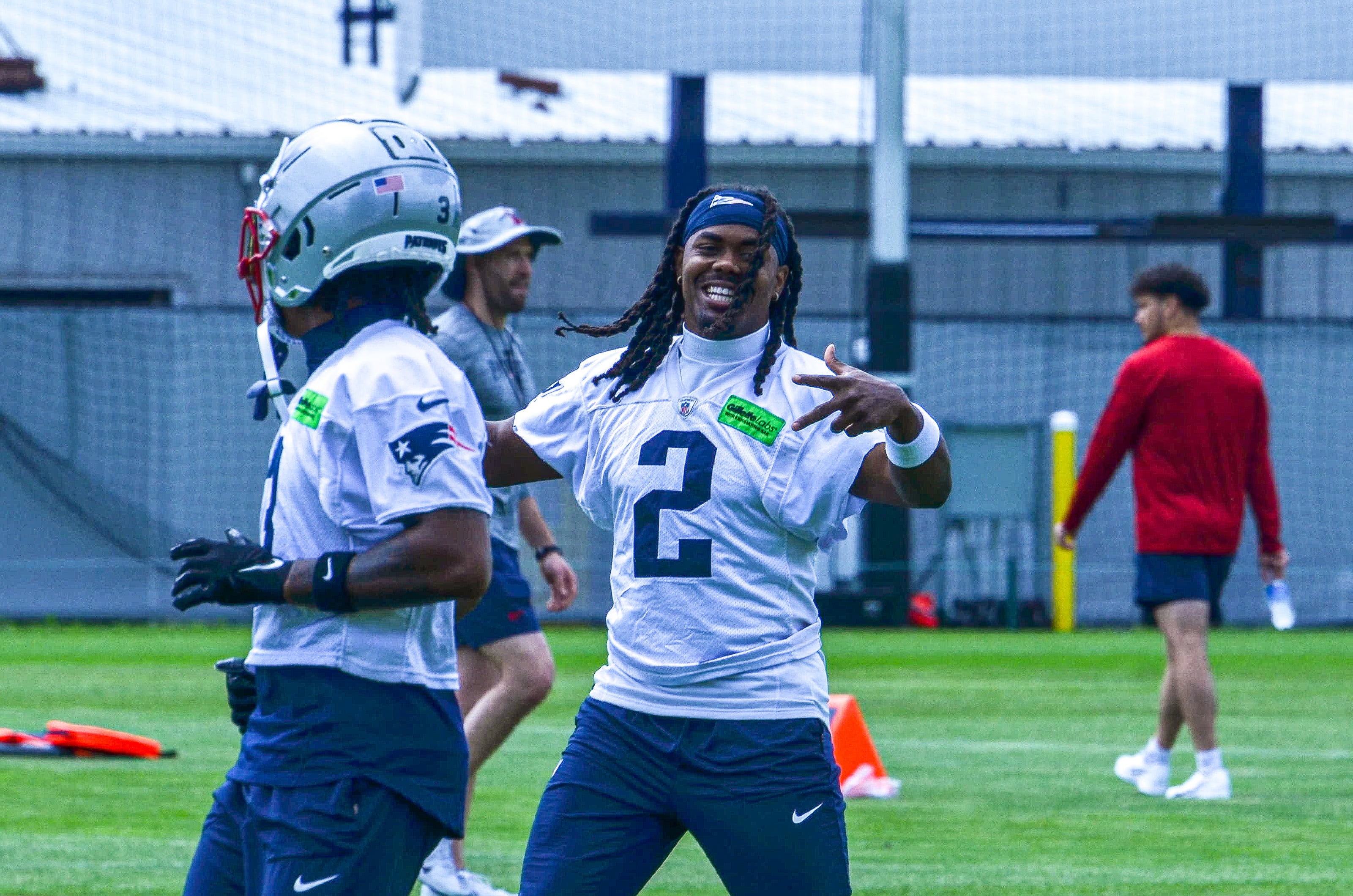 Monday, May 20 - WR KJ Osborn smiles during the stretching period at OTAs