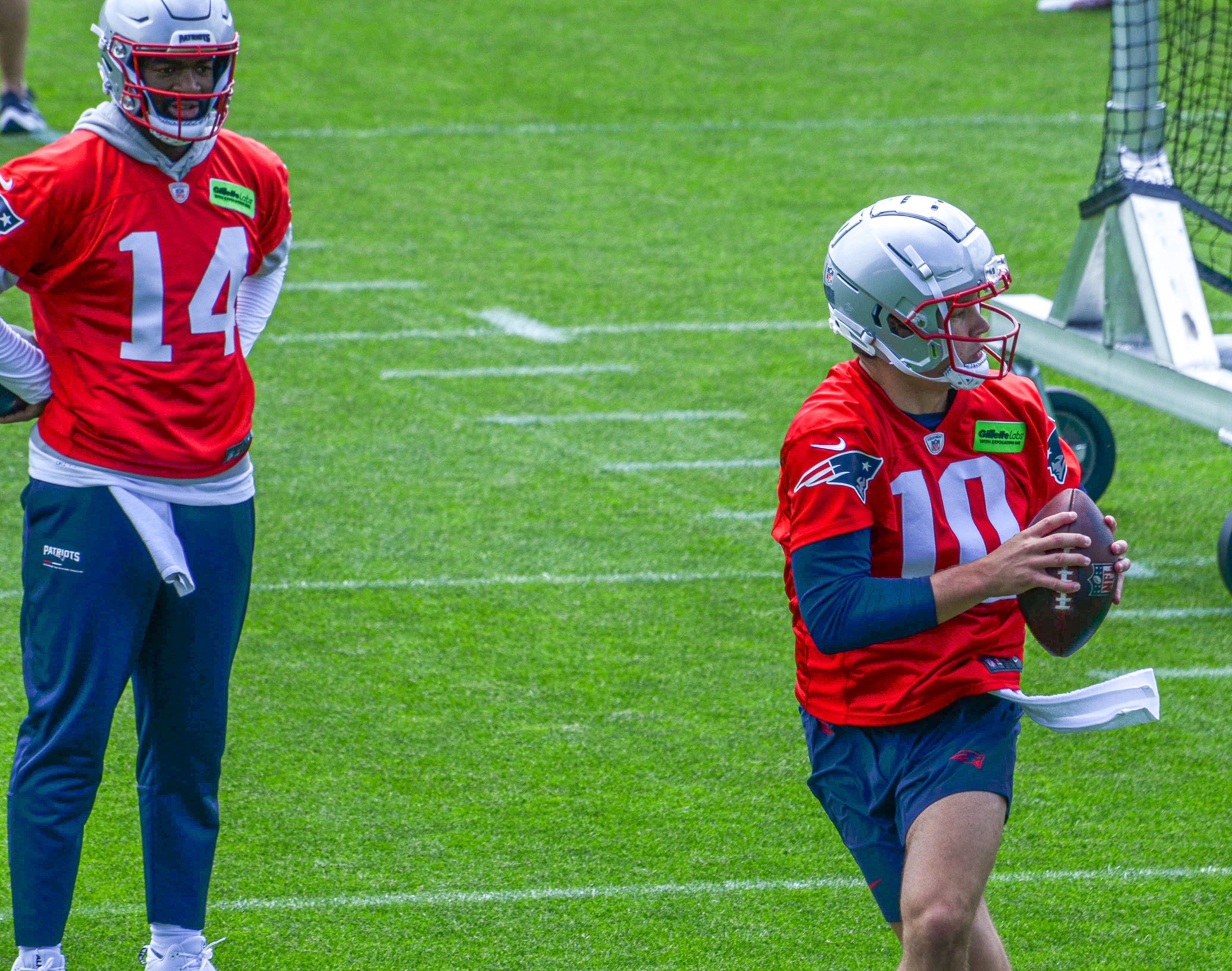 Monday, May 20 - Patriots QB Jacoby Brissett watches Drake Maye at OTAs