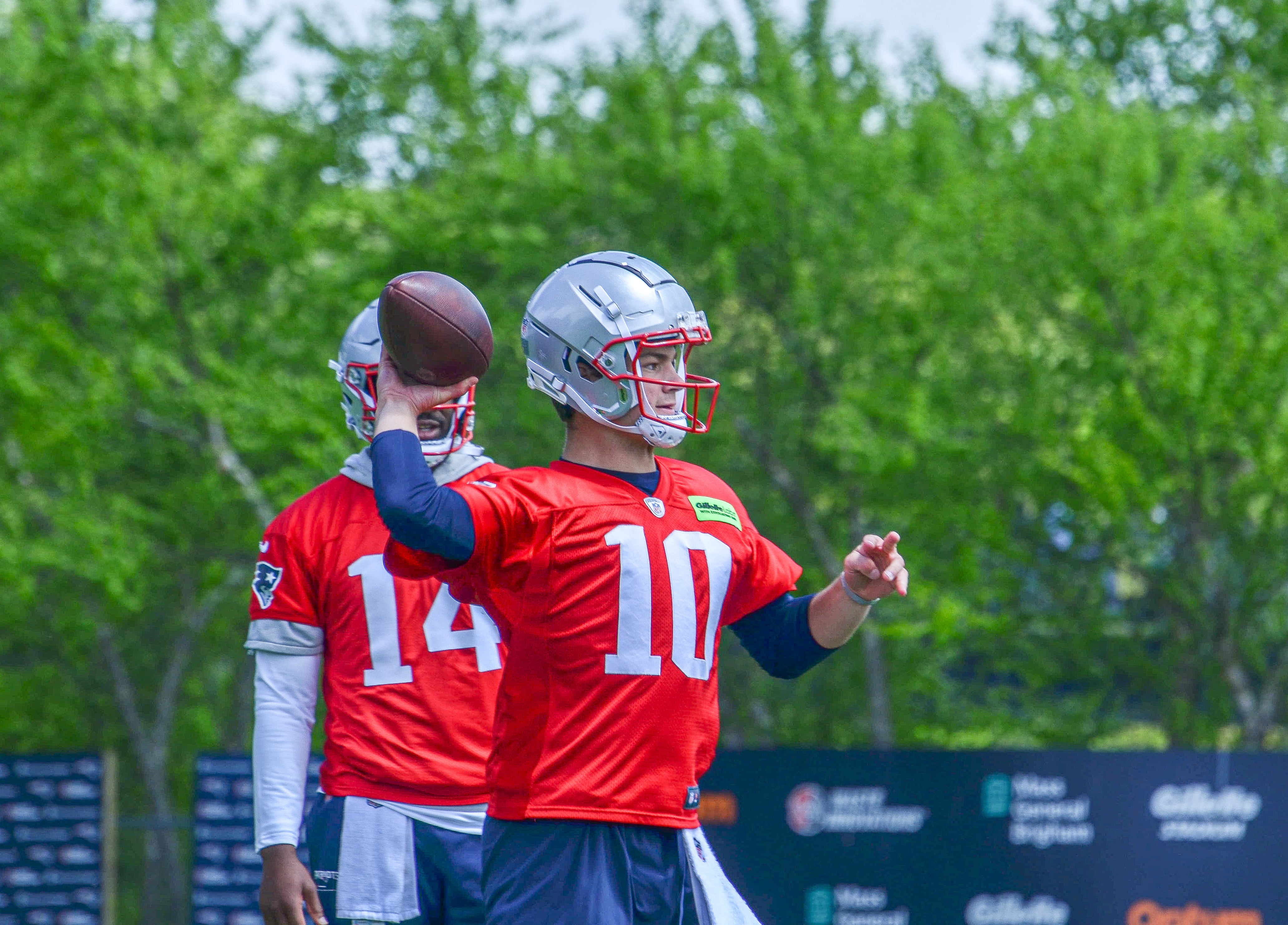 Monday, May 20 - Patriots QB Drake Maye throws while Jacoby Brissett watches at OTAs