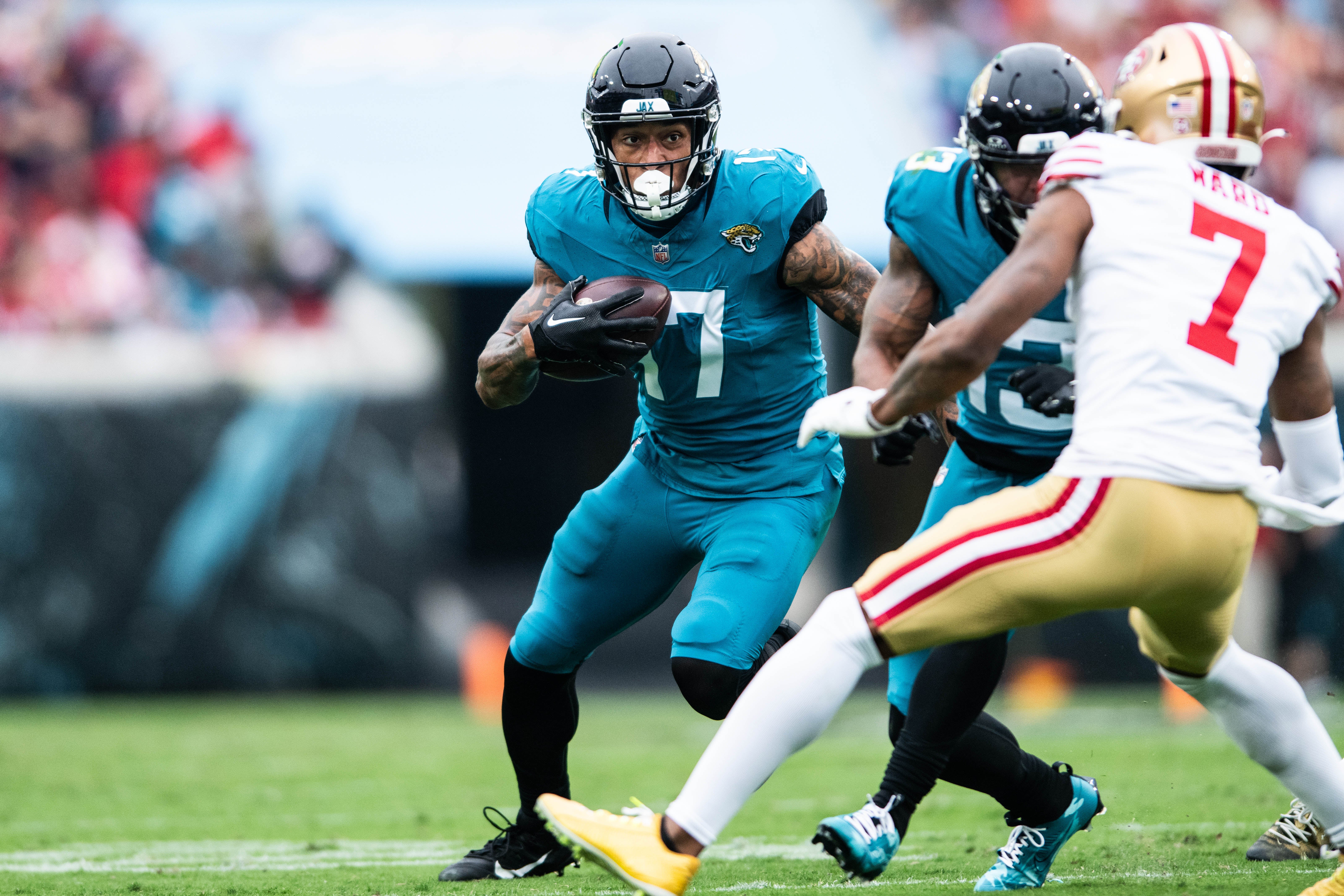 Nov 12, 2023; Jacksonville, Florida, USA; Jacksonville Jaguars tight end Evan Engram (17) runs the ball after the catch against the San Fransisco 49ers in the second quarter at EverBank Stadium.