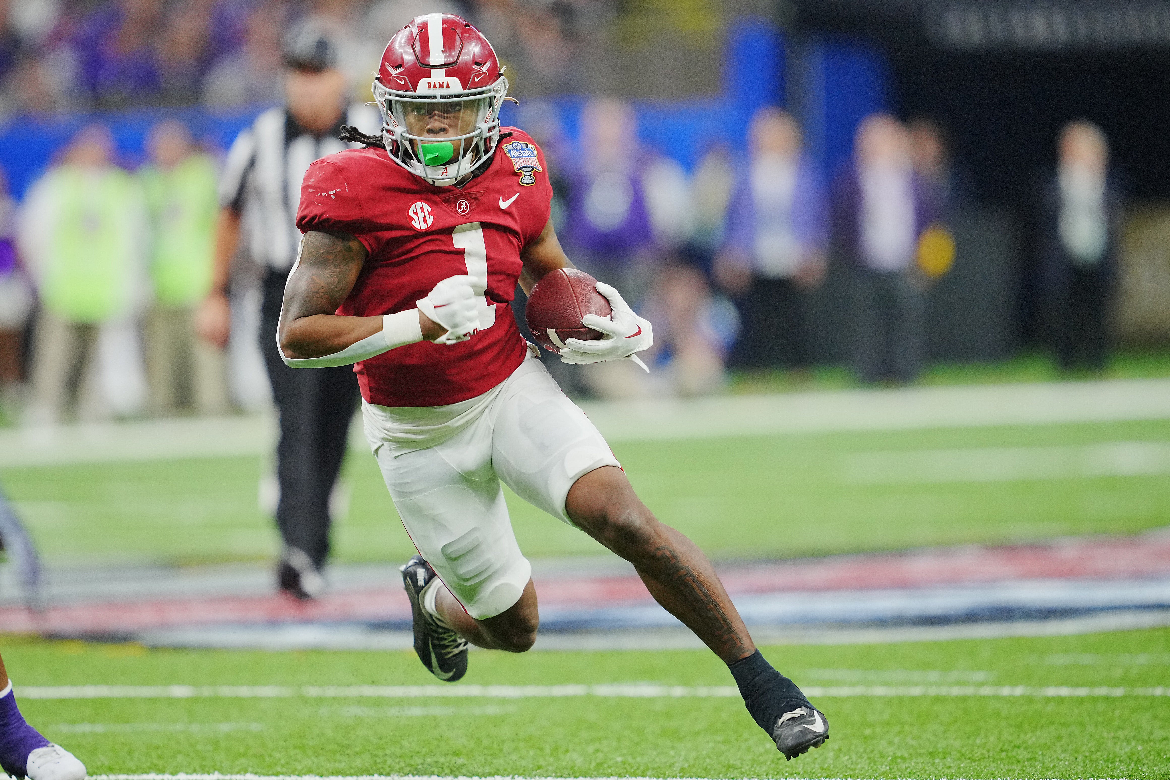 Dec 31, 2022; New Orleans, LA, USA; Alabama Crimson Tide running back Jahmyr Gibbs (1) runs the ball against the Kansas State Wildcats during the second half in the 2022 Sugar Bowl at Caesars Superdome. Mandatory Credit: Andrew Wevers-USA TODAY Sports  