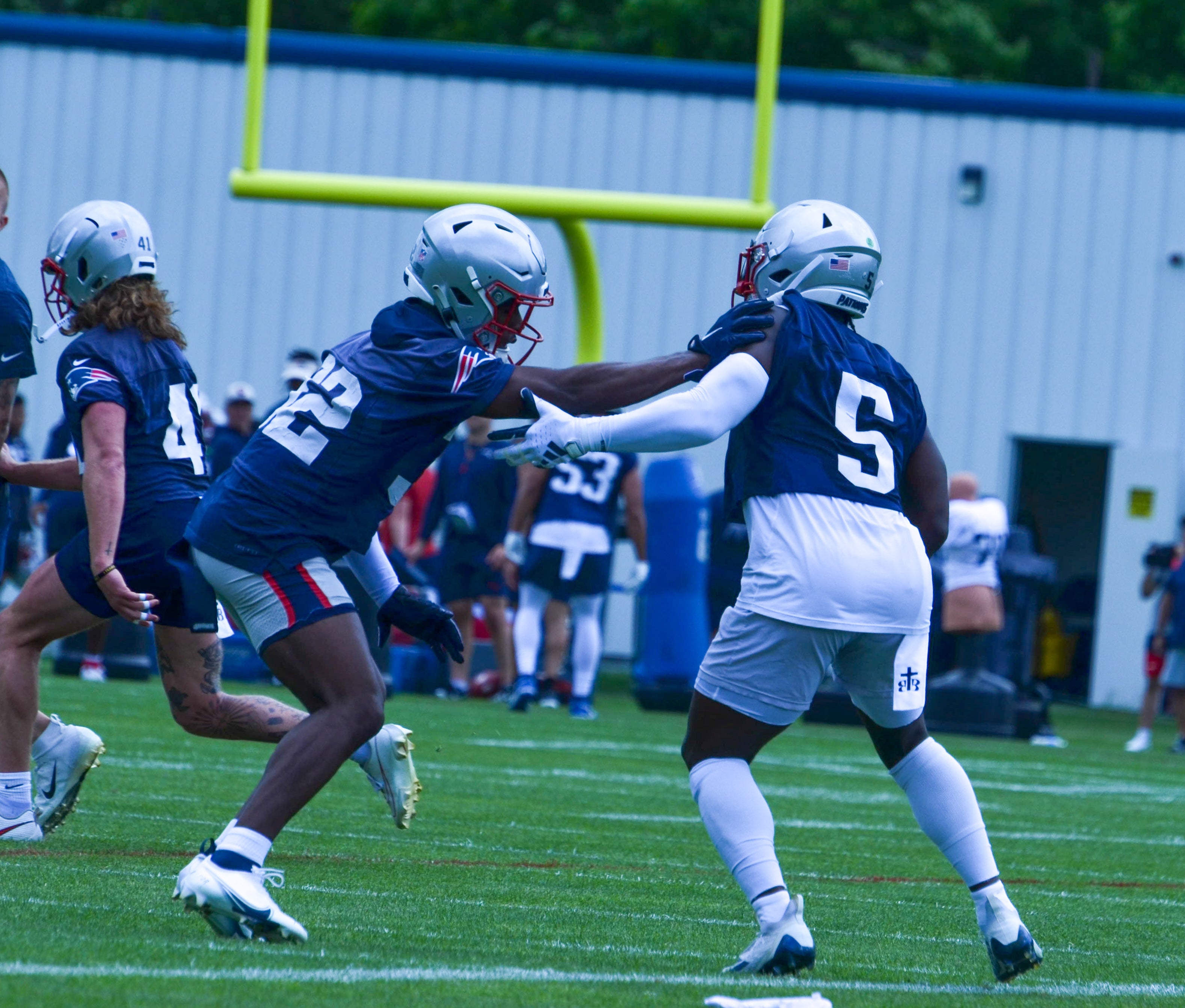 Patriots safety Jabrill Peppers works with another player on defensive drills during OTAs - May 29, 2024