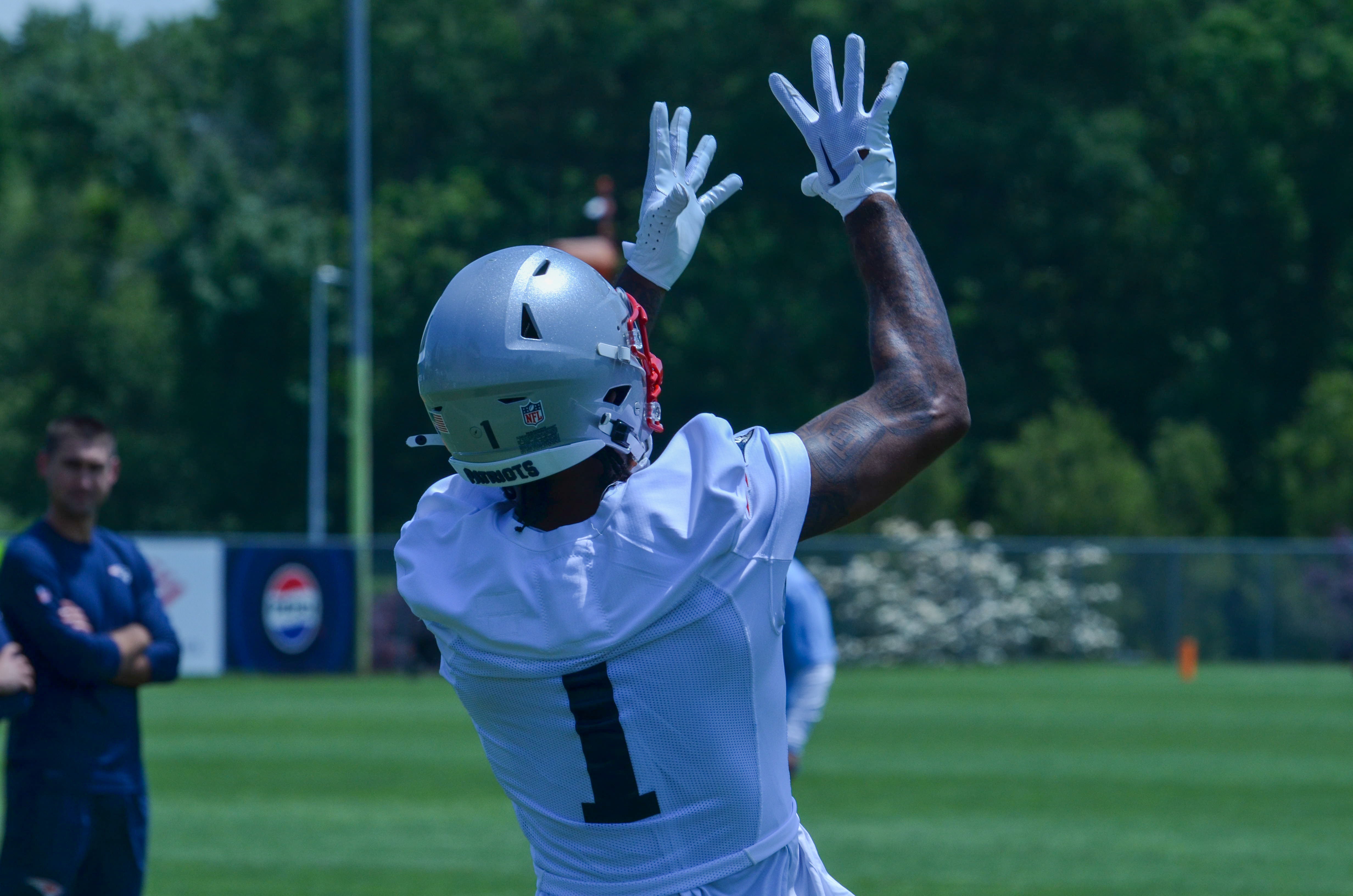 Patriots WR Ja'Lynn Polk makes a catch during a drill at Tuesday's OTAs - June 4, 2024