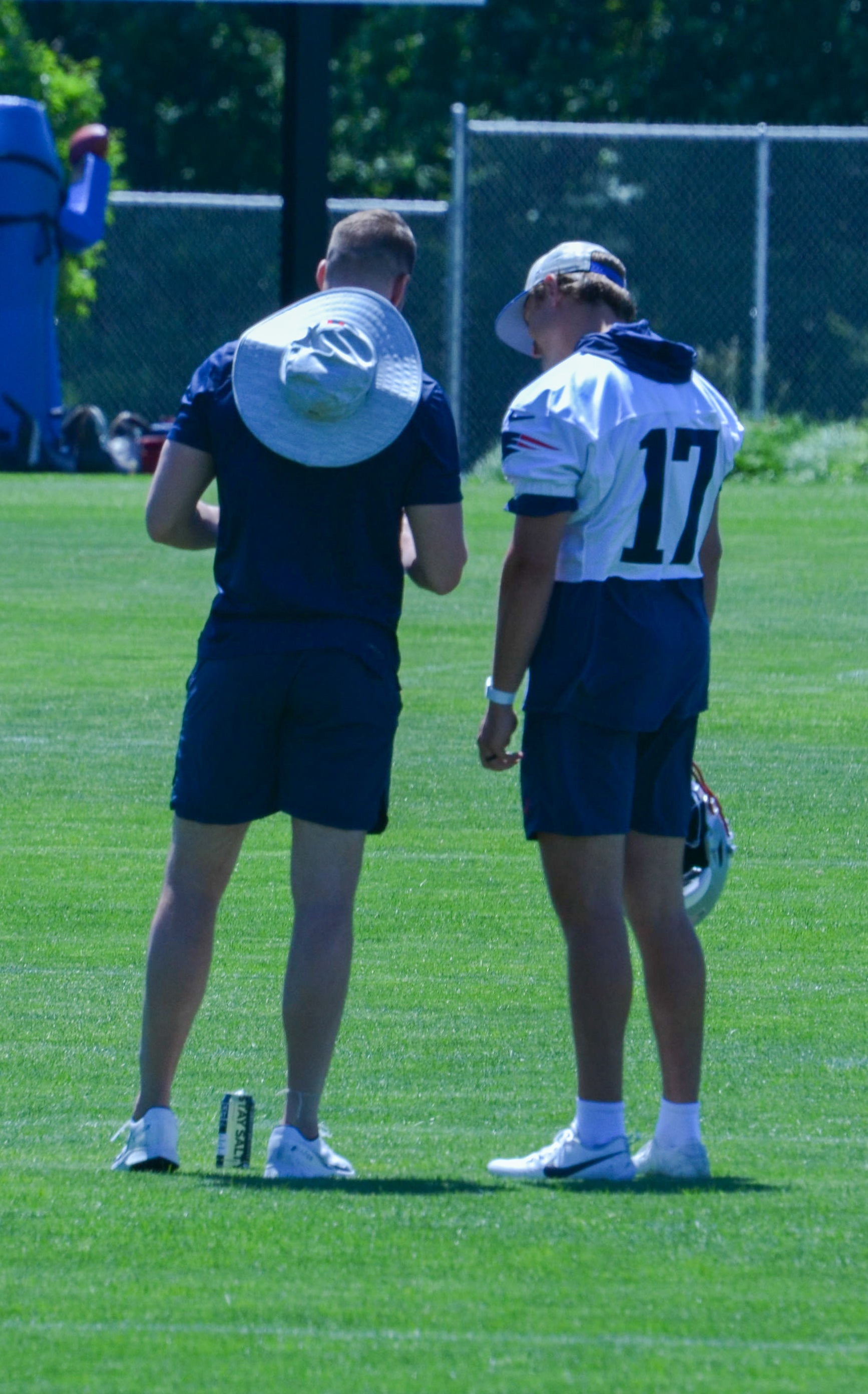 Patriots special teams coordinator Jeremy Springer coaches P Bryce Baringer at the first day of Mandatory Minicamp at Gillette Stadium - June 10, 2024