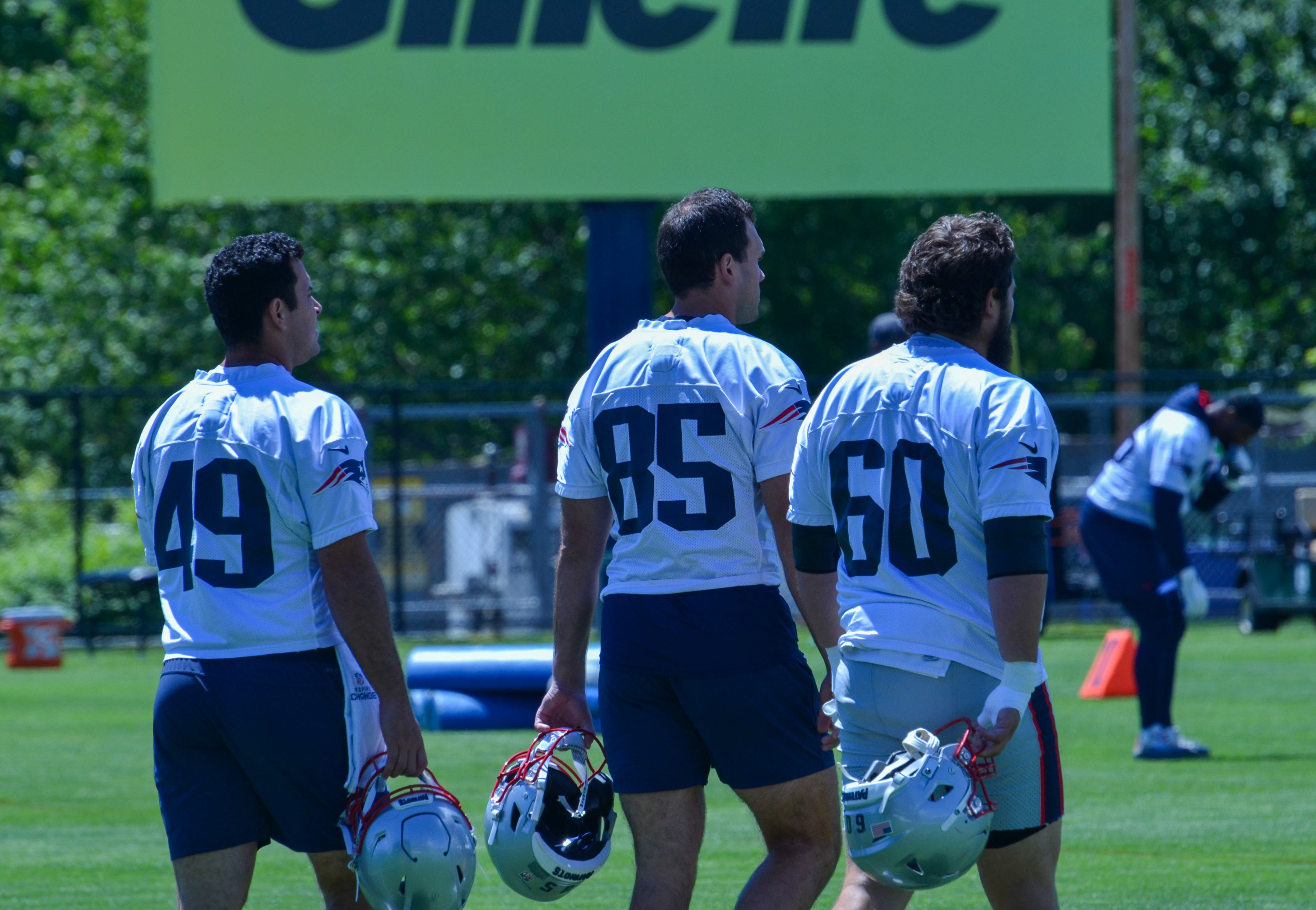 Patriots LS Joe Cardona, TE Hunter Henry, and C David Andrews at the first day of Mandatory Minicamp at Gillette Stadium - June 10, 2024