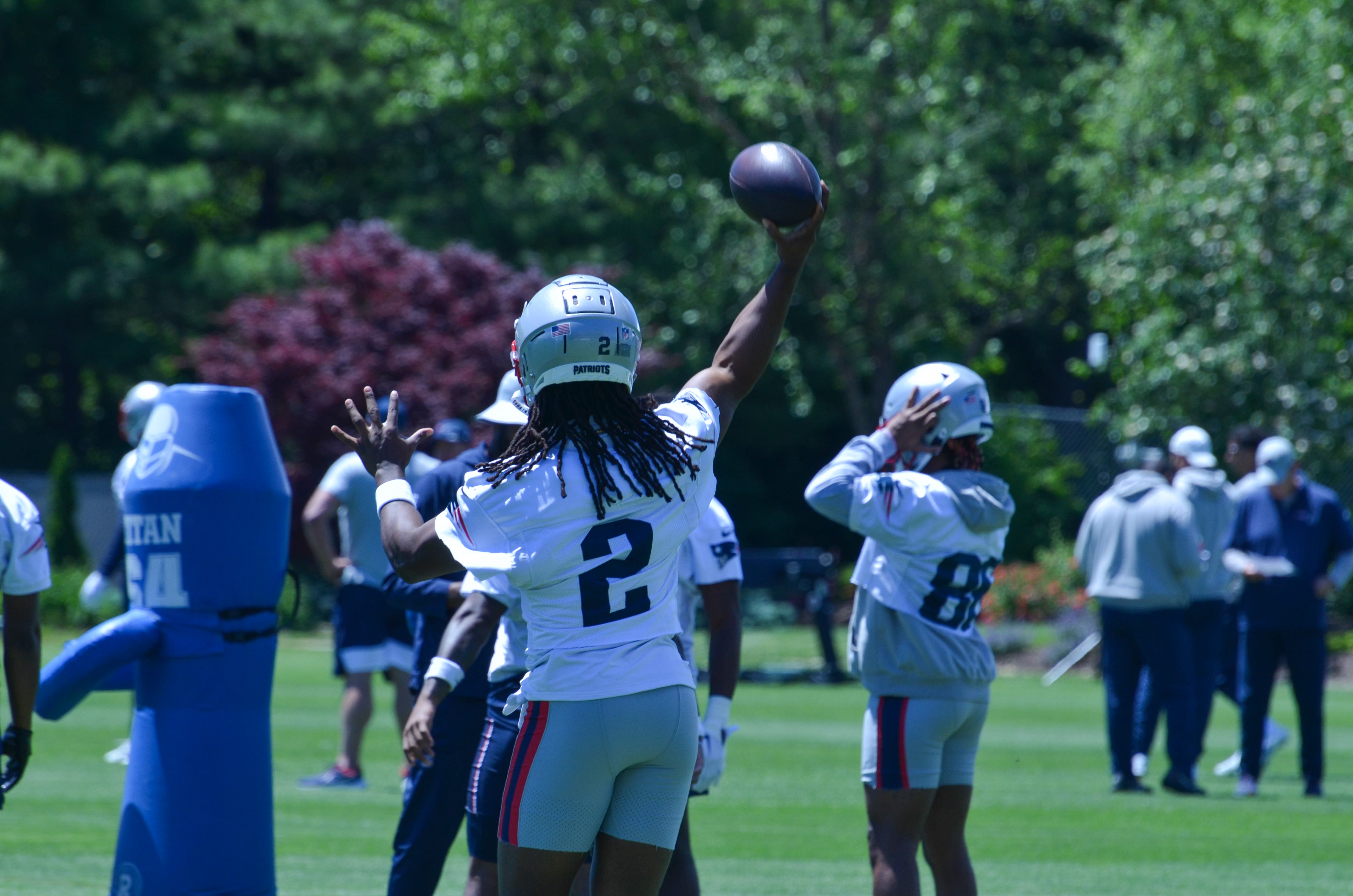 Patriots WR KJ Osborn throws the ball at the first day of Mandatory Minicamp at Gillette Stadium - June 10, 2024