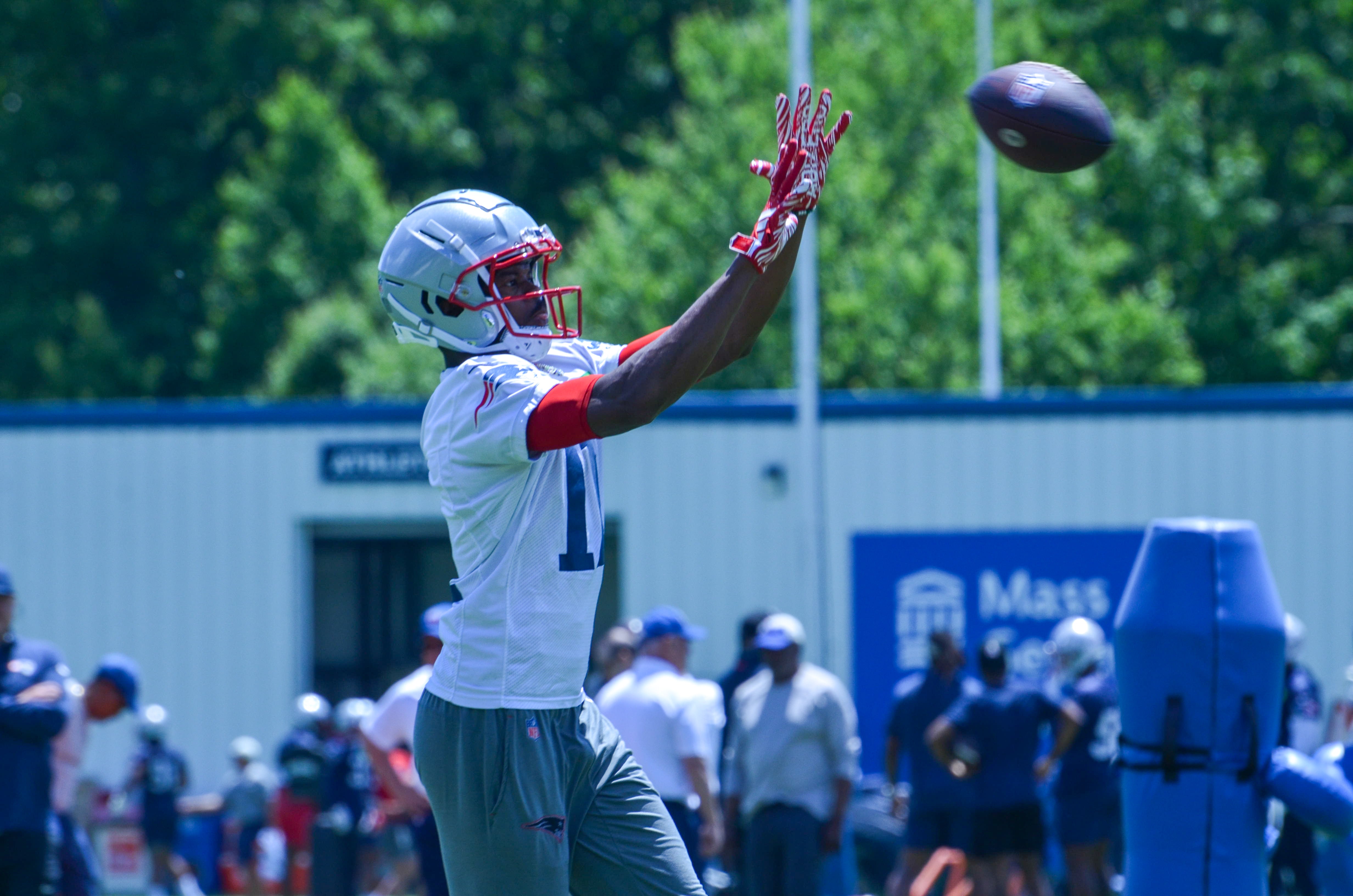 Patriots WR Tyquan Thornton reaching out to make a catch during the first day of Mandatory Minicamp at Gillette Stadium - June 10, 2024