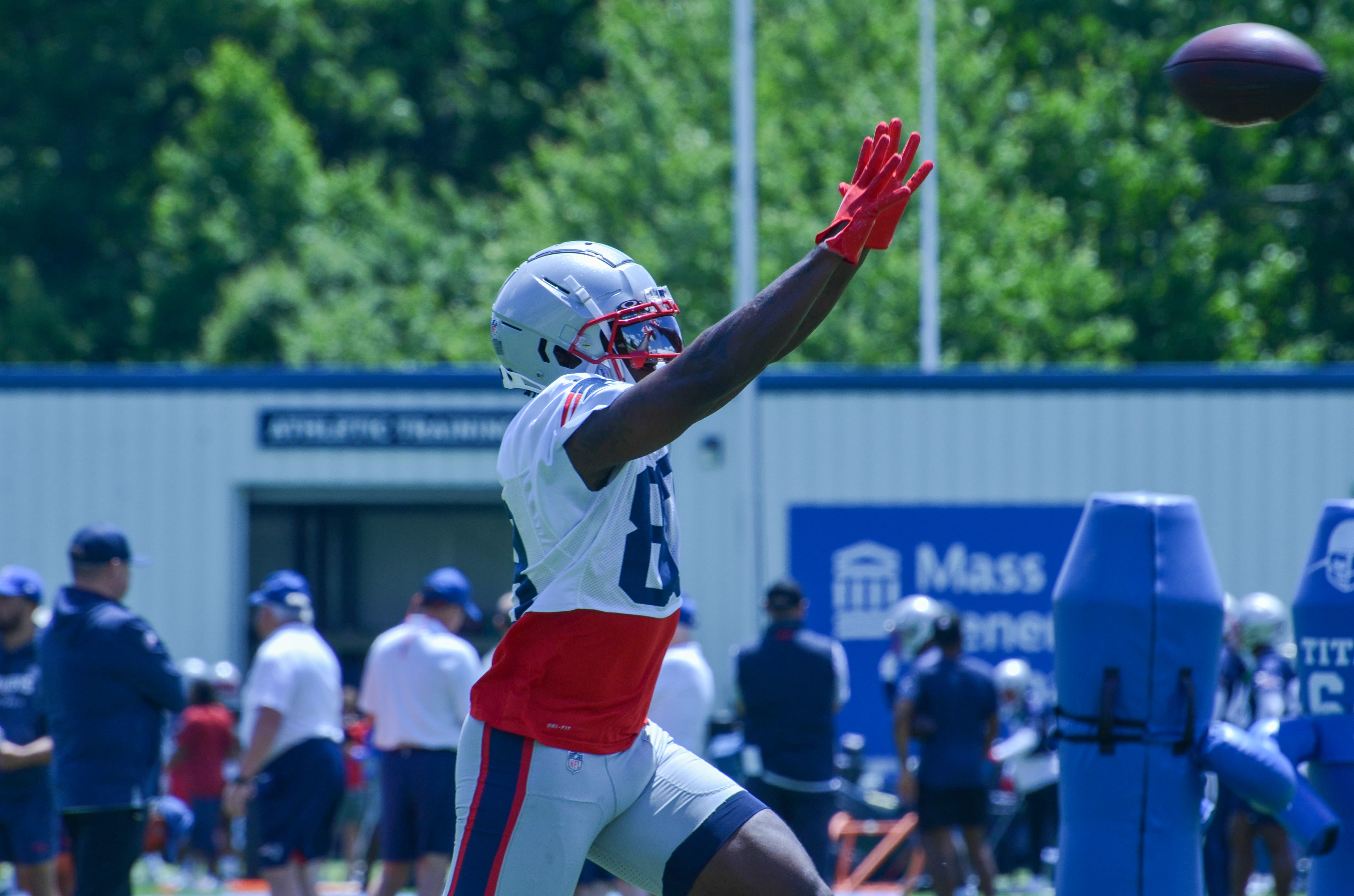 Patriots WR Jalen Reagor reaching out to make a catch during the first day of Mandatory Minicamp at Gillette Stadium - June 10, 2024